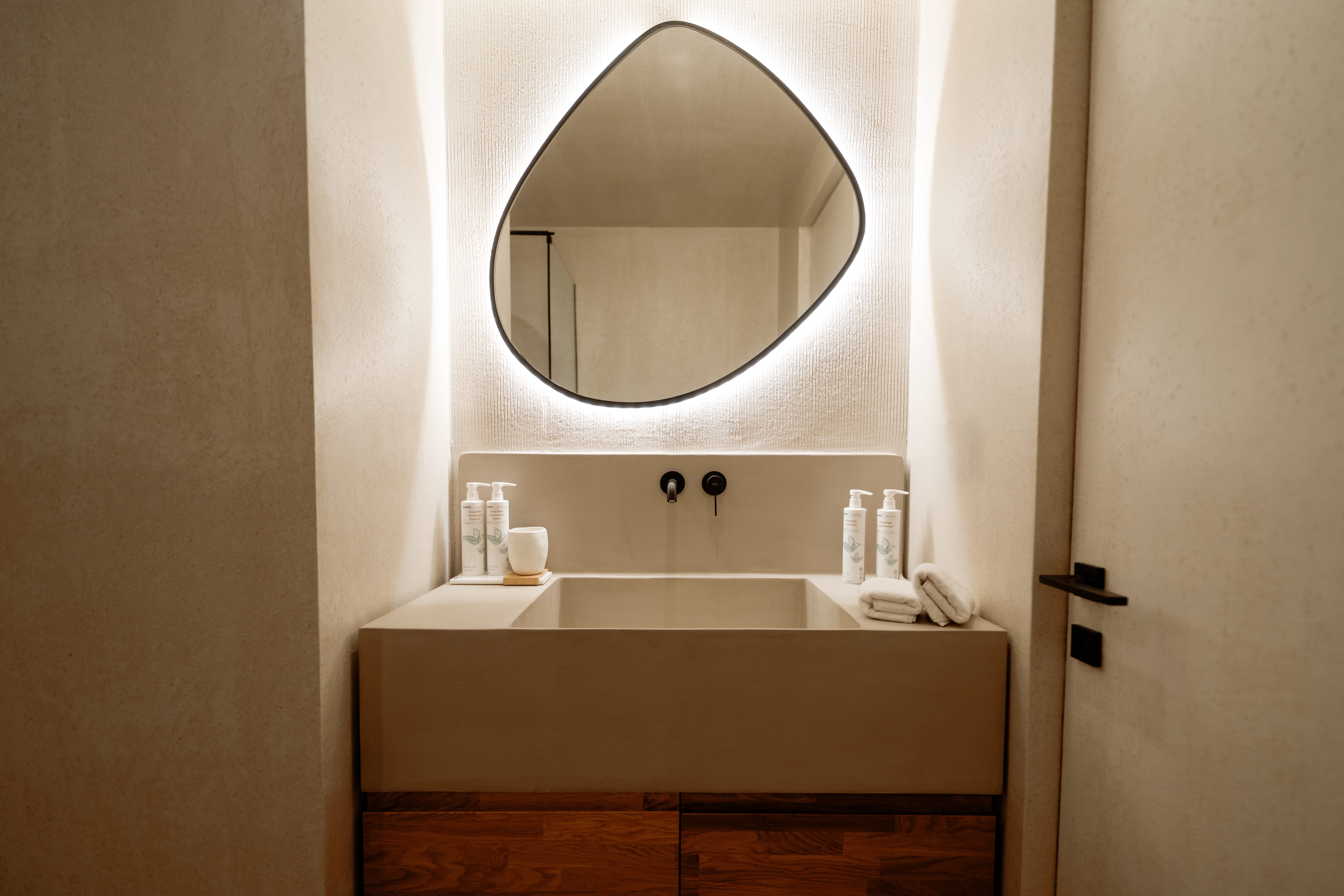 a bathroom with a large mirror