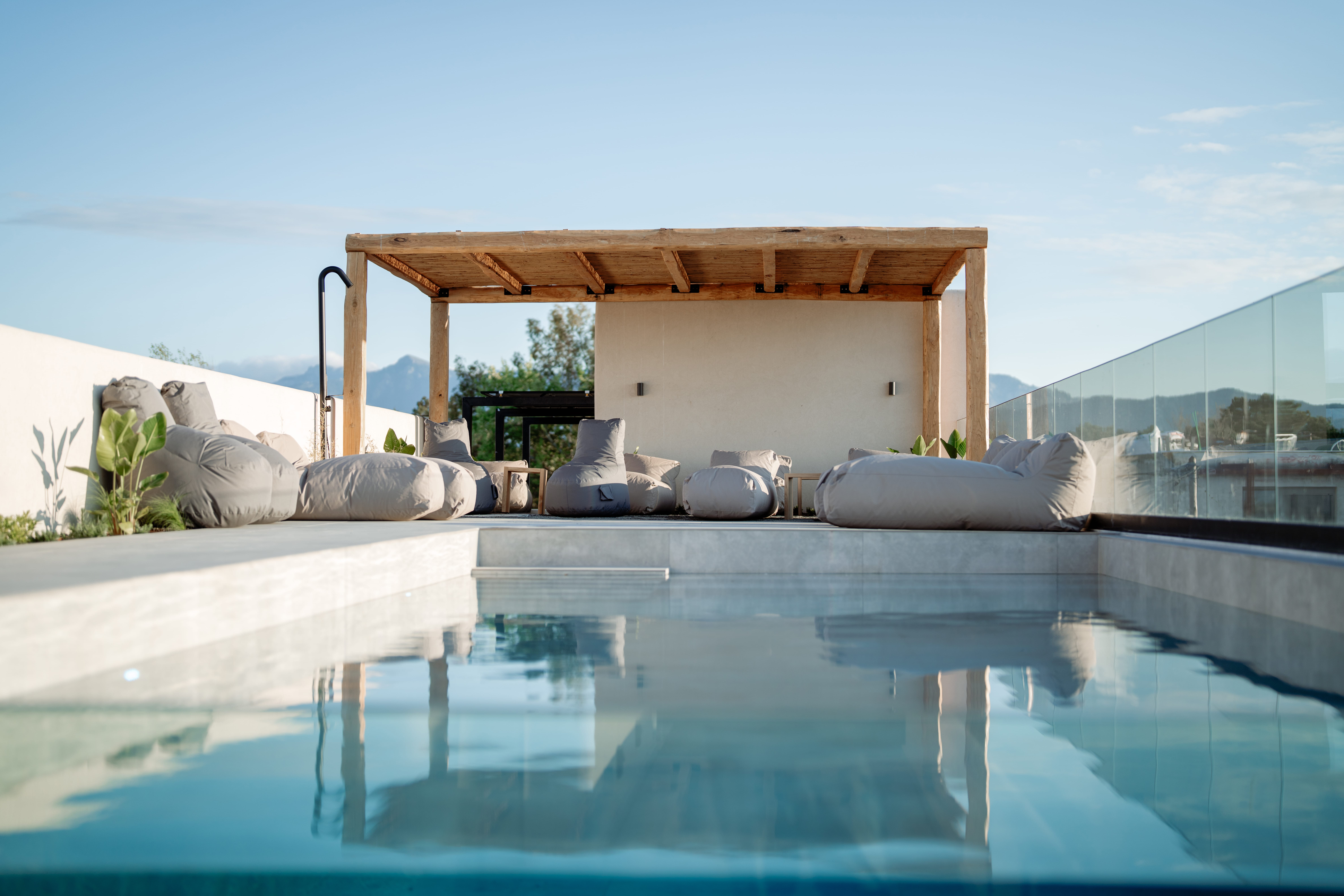a pool with a building in the background