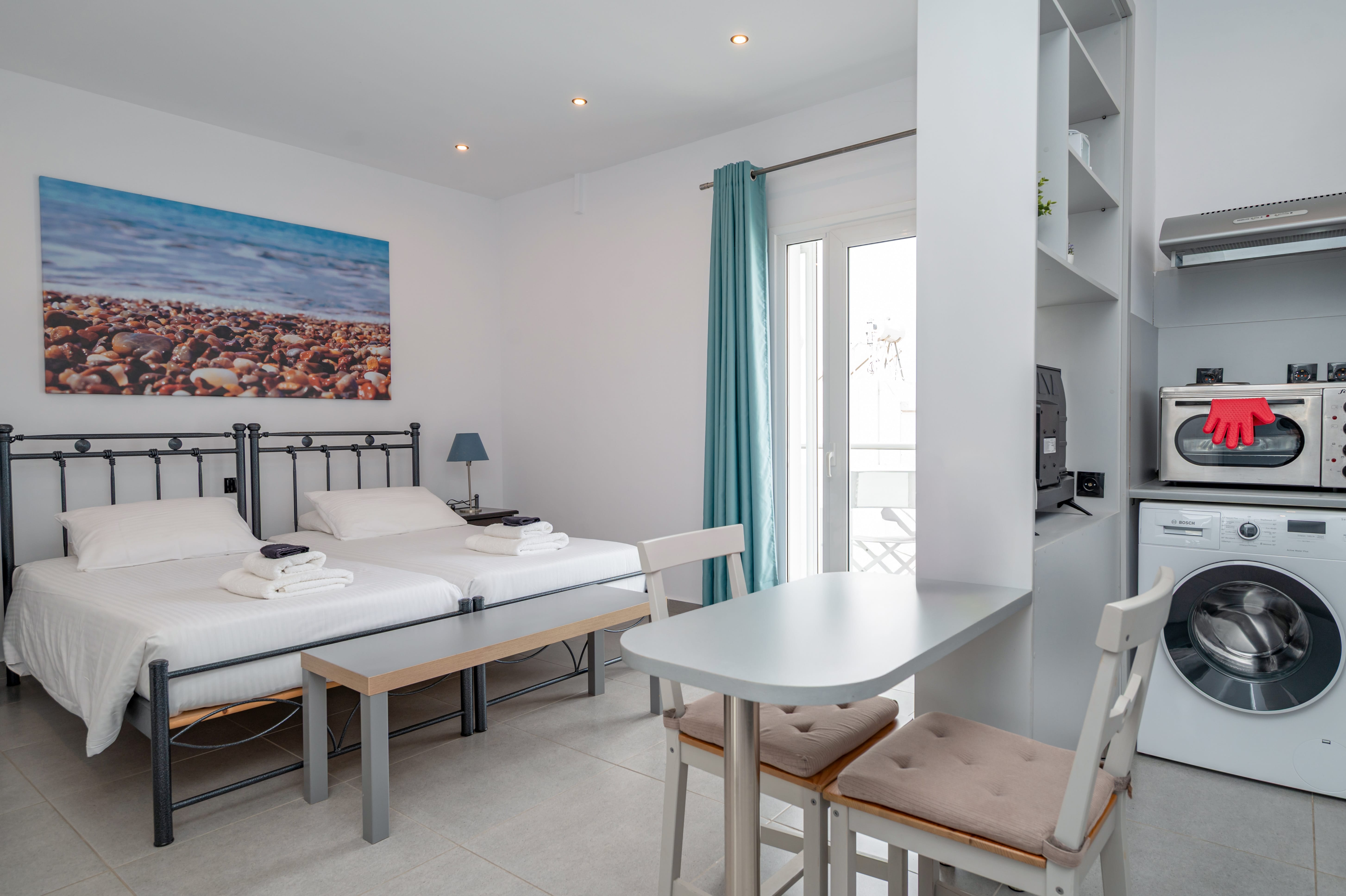 a bedroom with a bed and a table