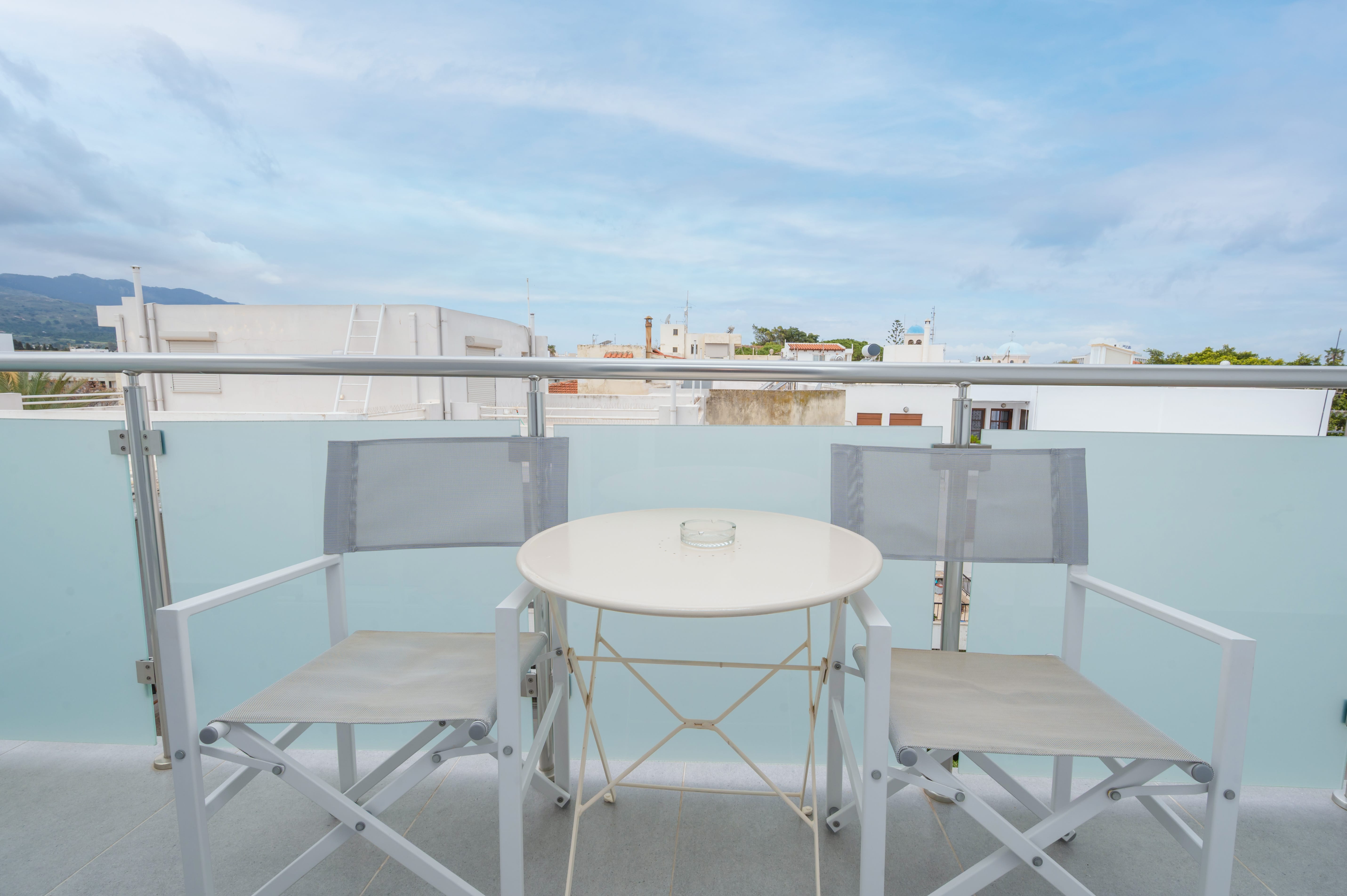 a table and chairs on a deck
