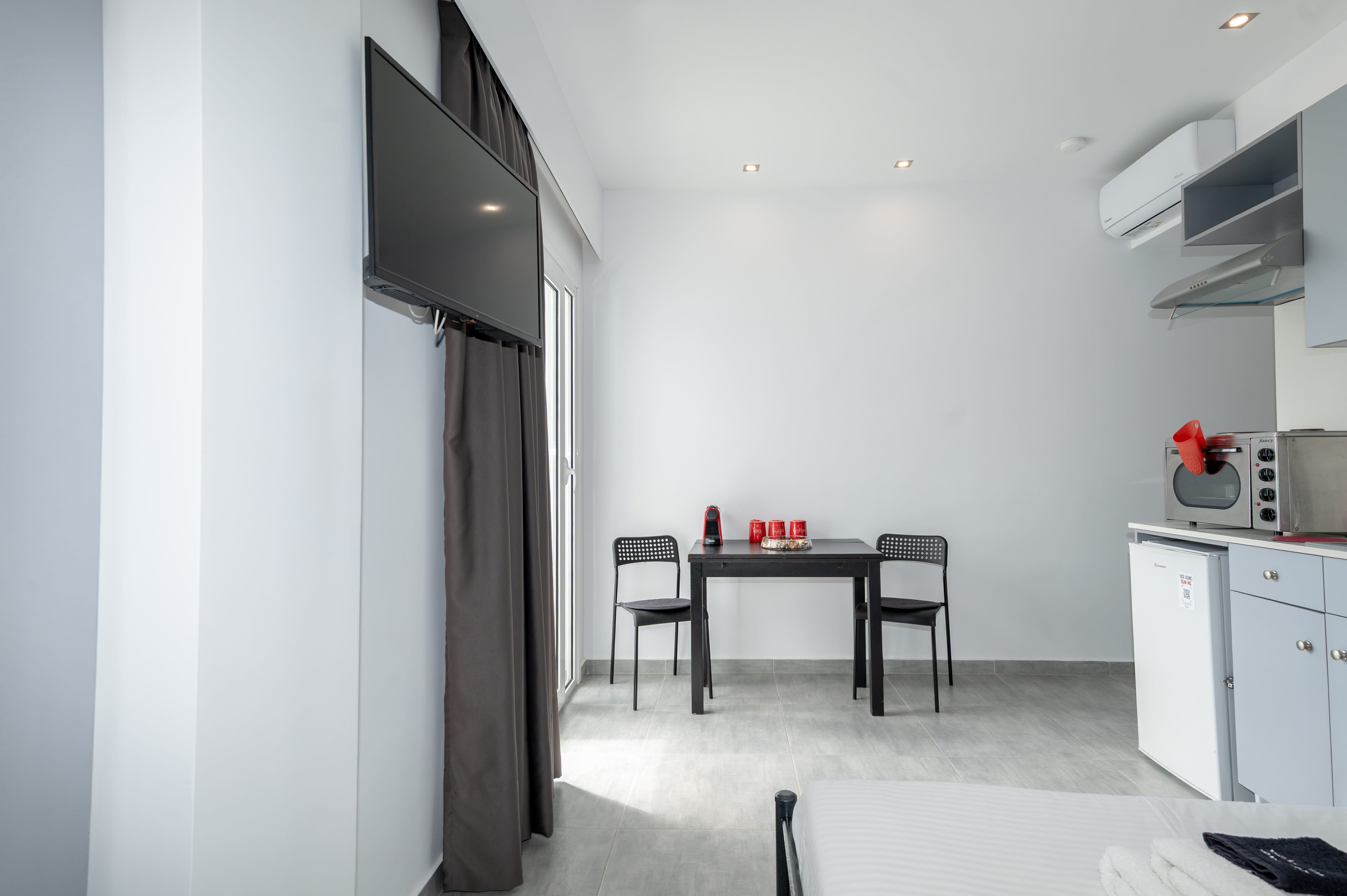 a room with a table and chairs
