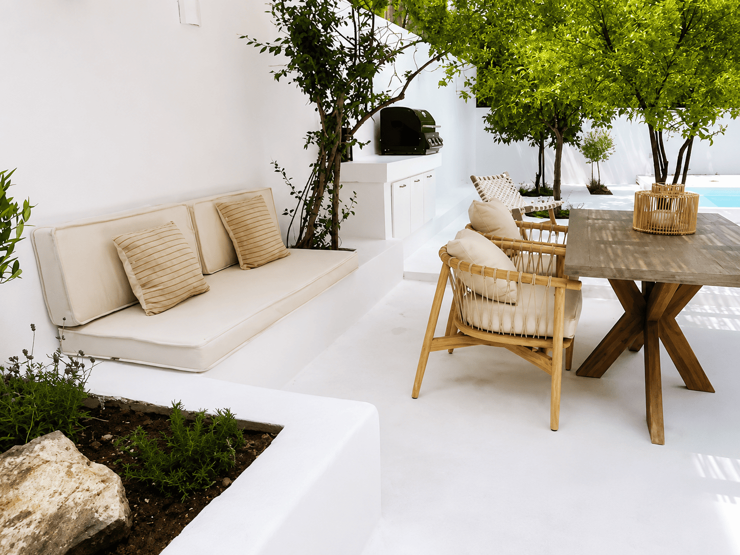 a living room with a couch and chairs