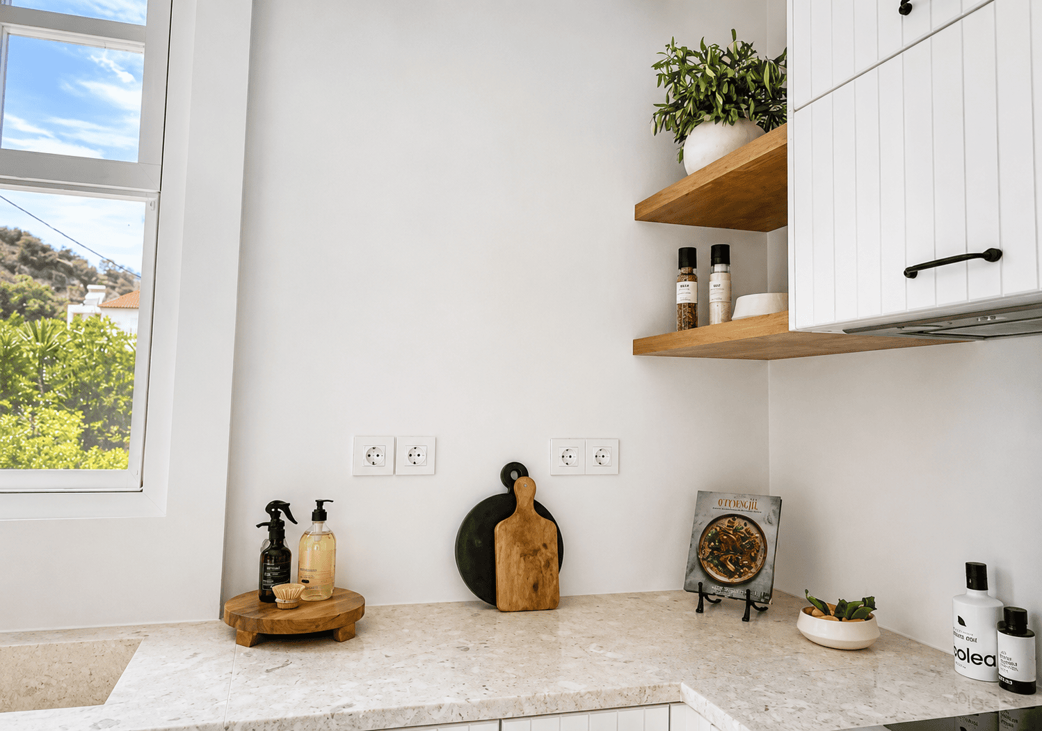 a kitchen with white walls