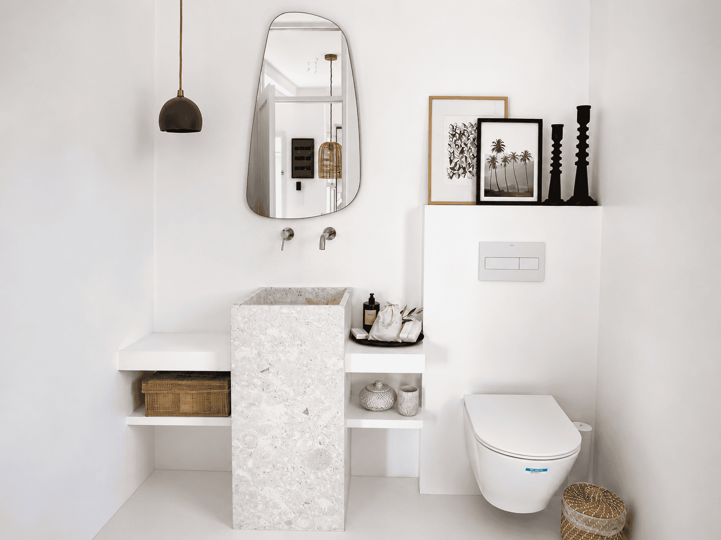 a bathroom with a mirror and a toilet