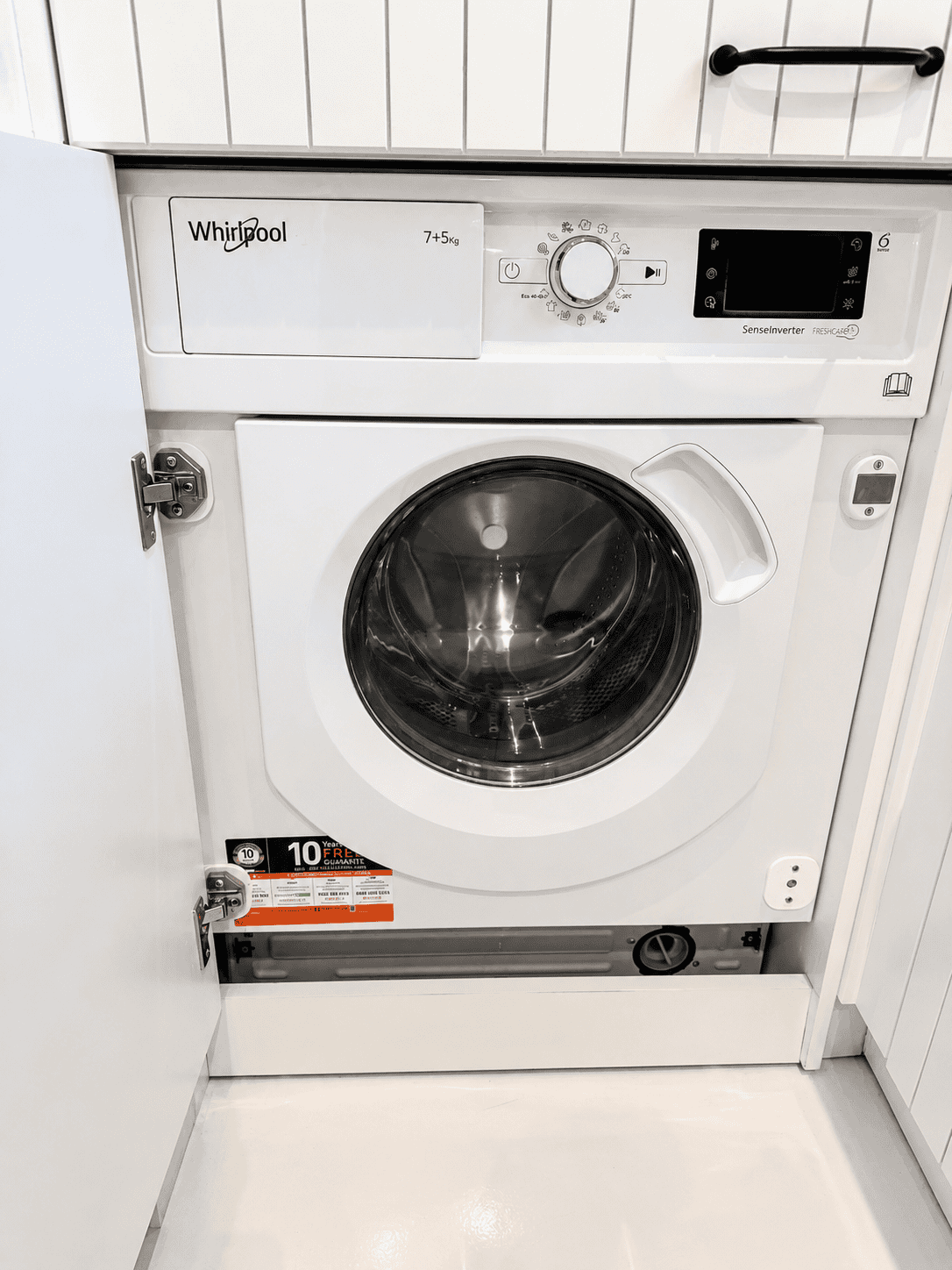 a washing machine in a room