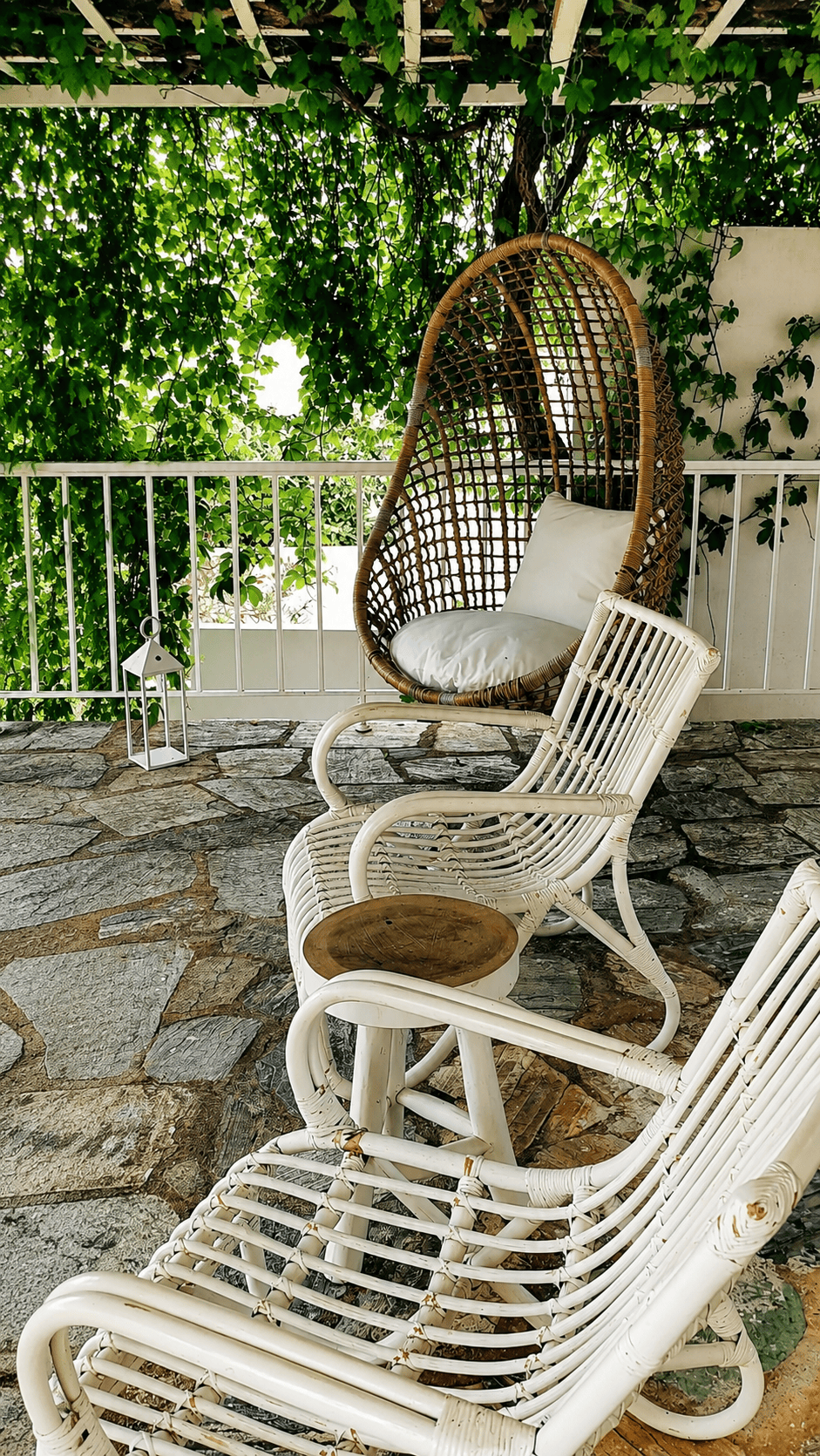 a couple of chairs on a patio