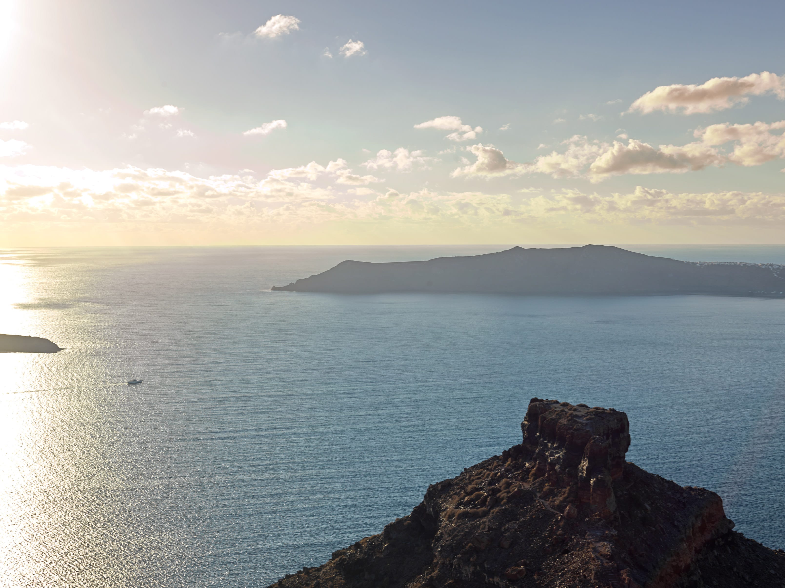 a body of water with a land in the distance