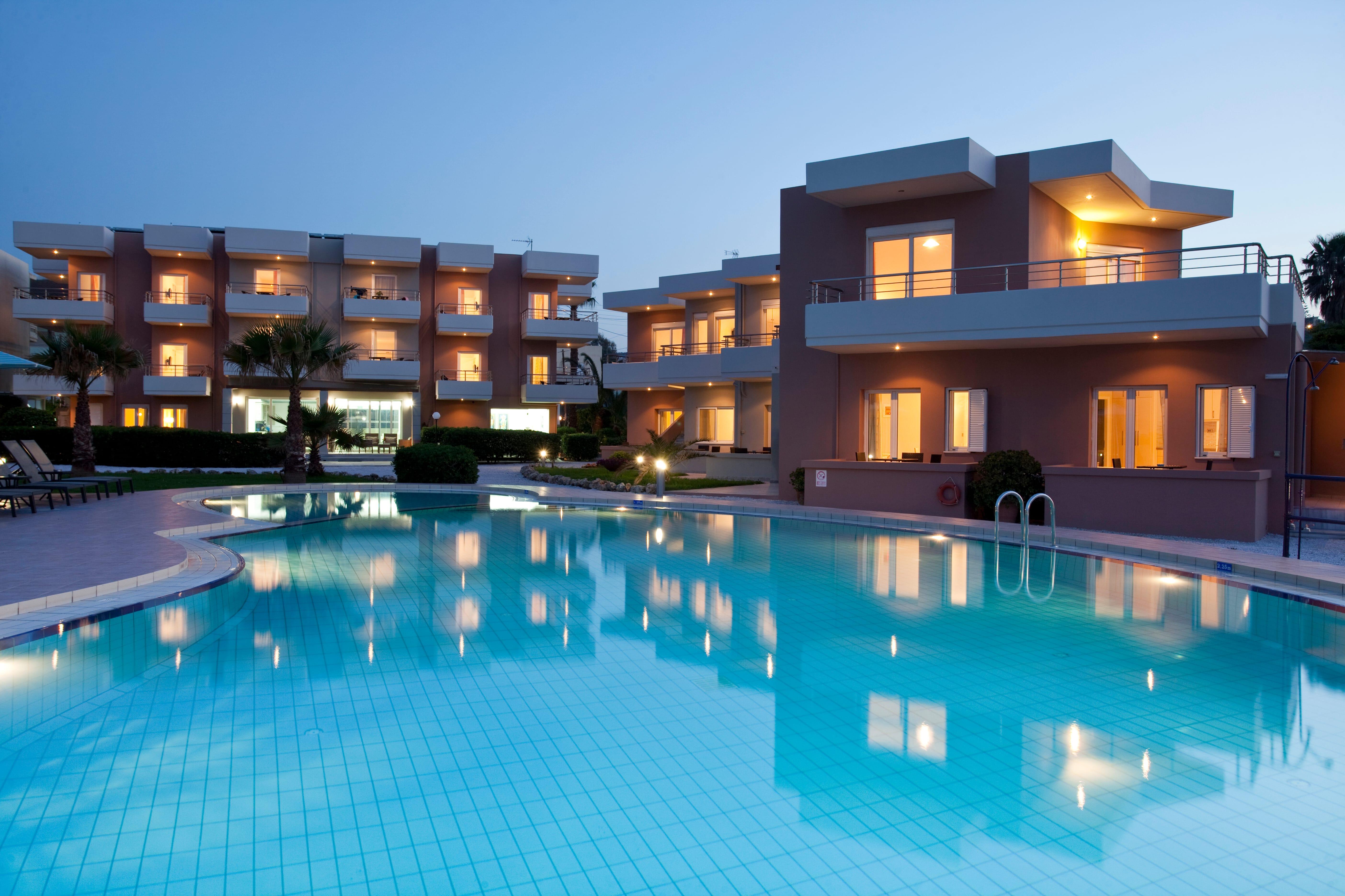 a pool in front of a building