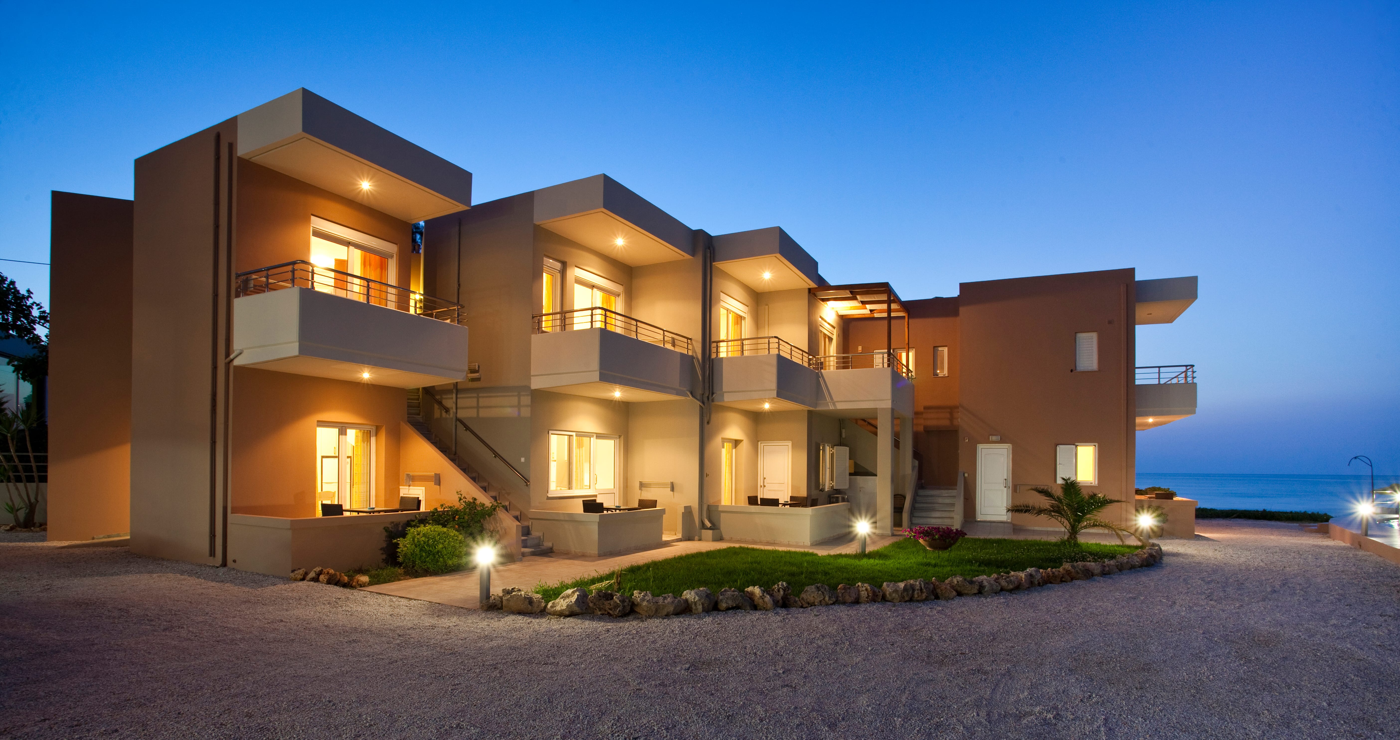 a house with a pool in the front