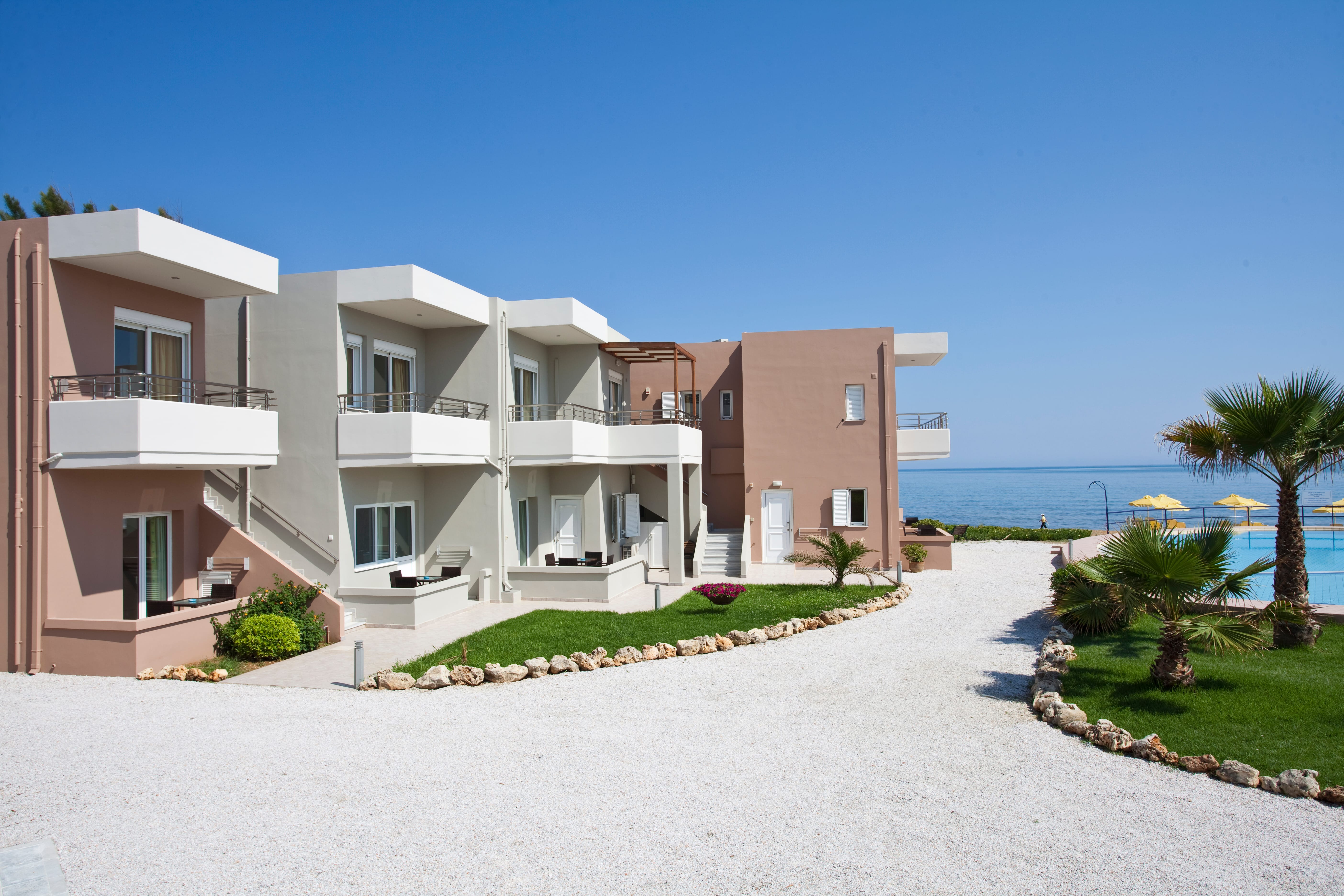 a building with a beach in the background