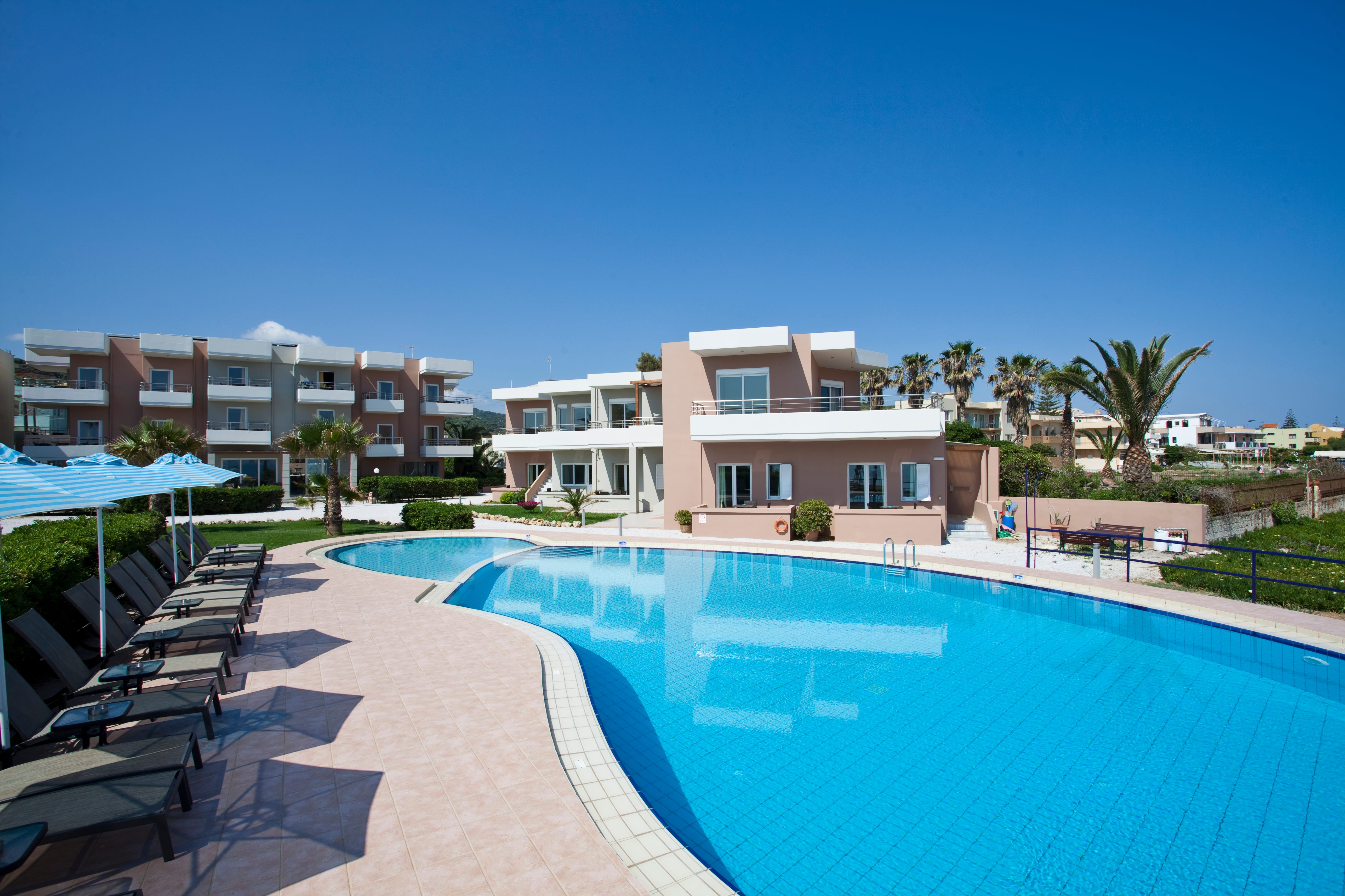 a swimming pool in front of a building