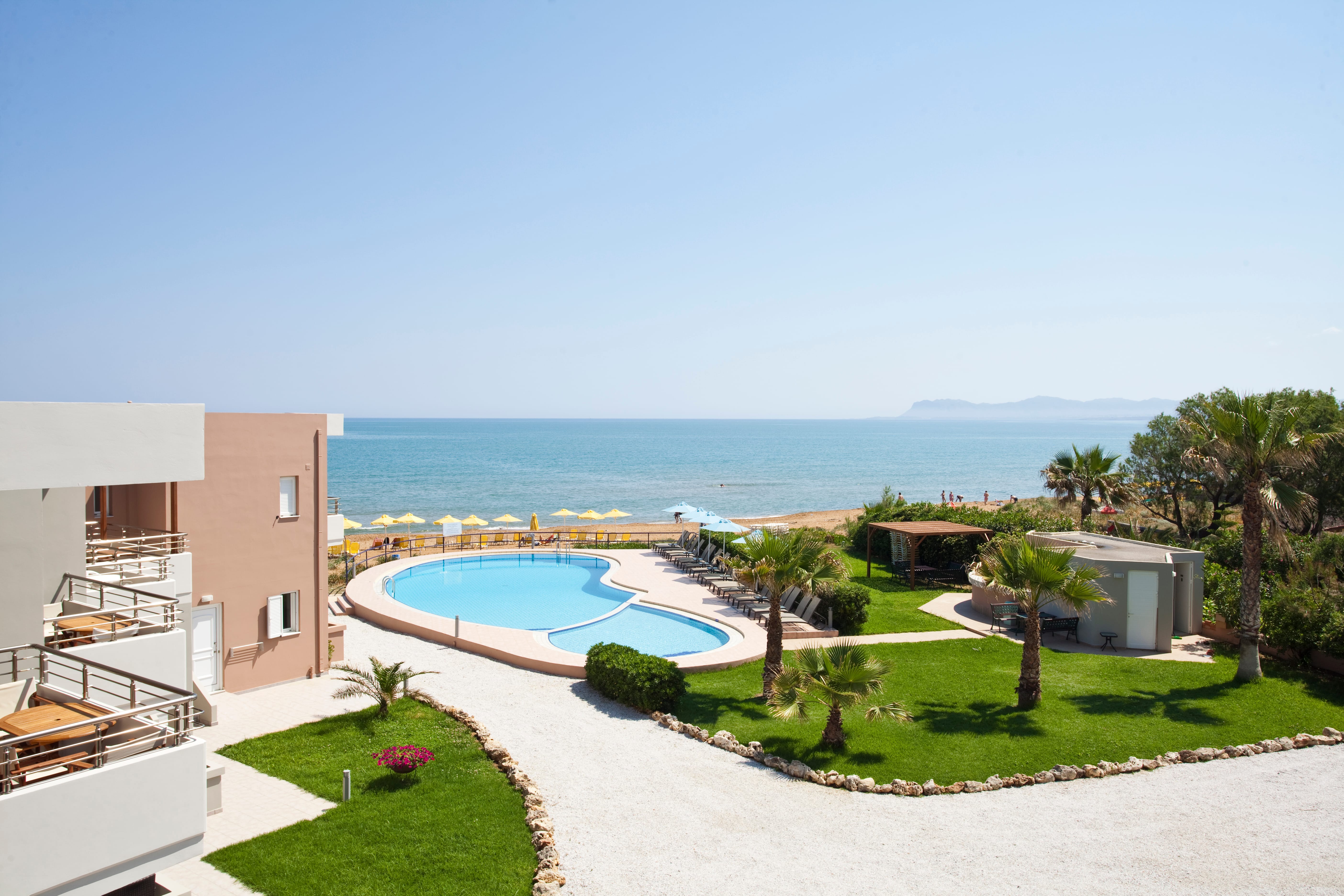 a pool next to a beach