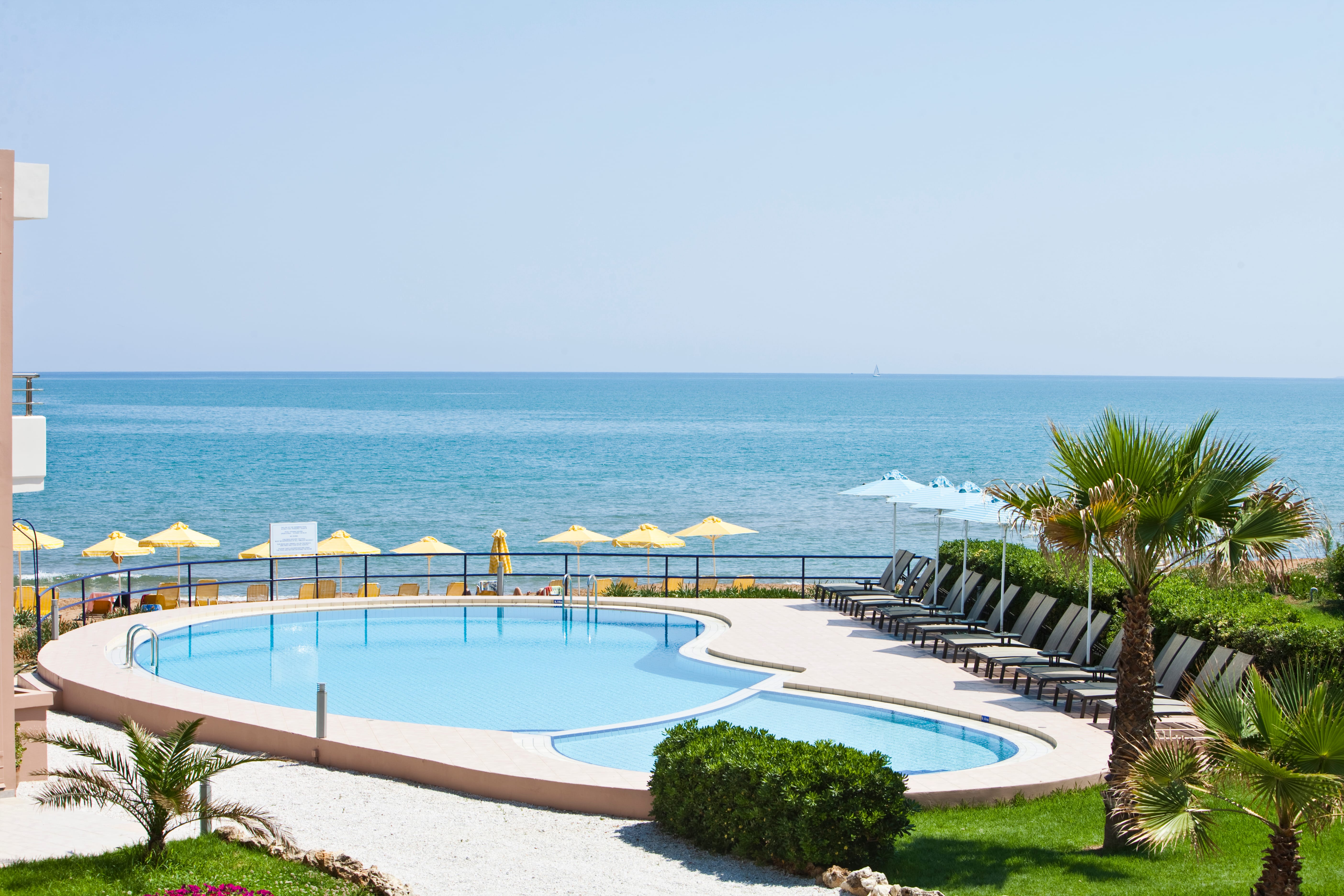 a pool next to a beach
