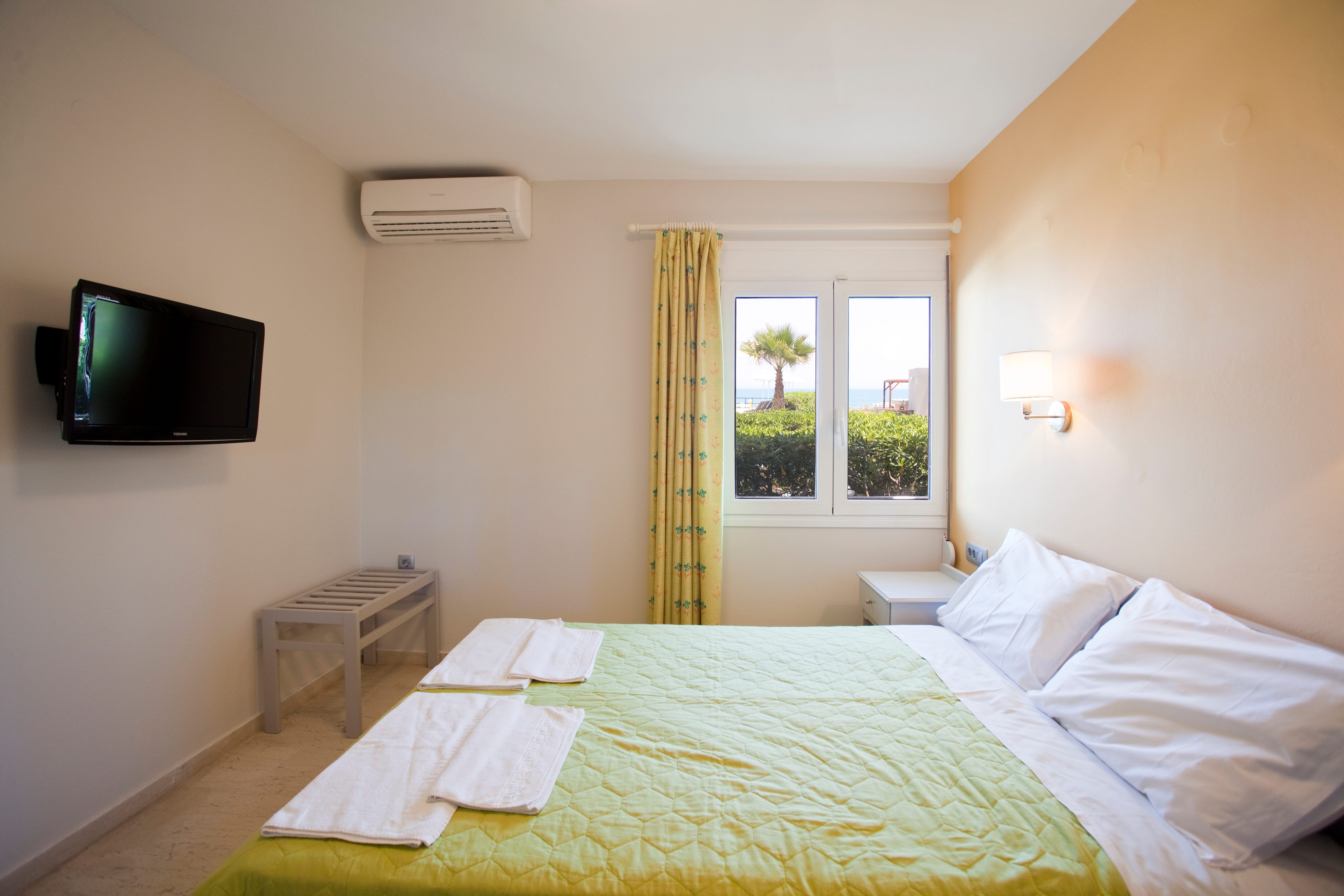 a hotel room with two beds