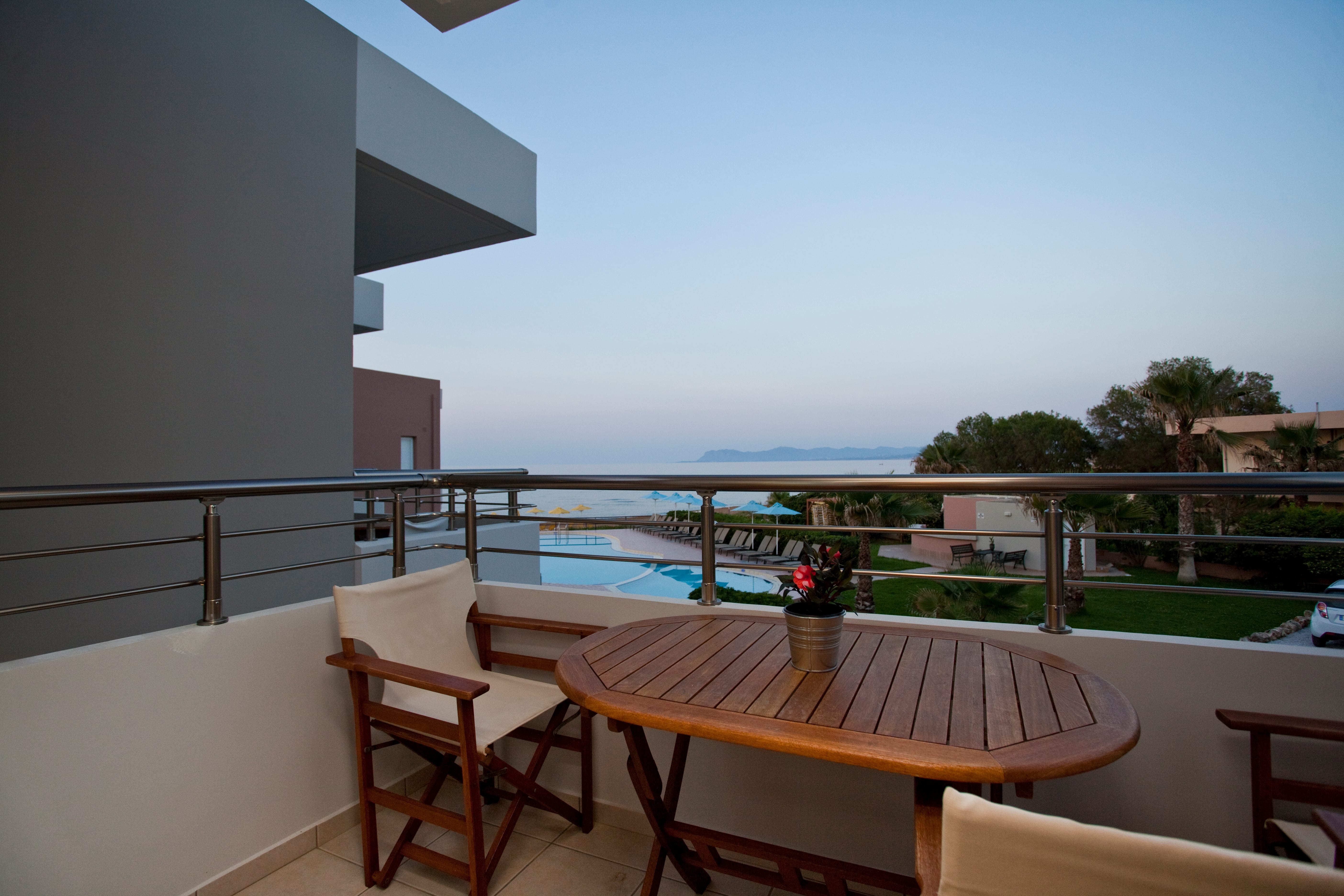 a table and chairs on a deck