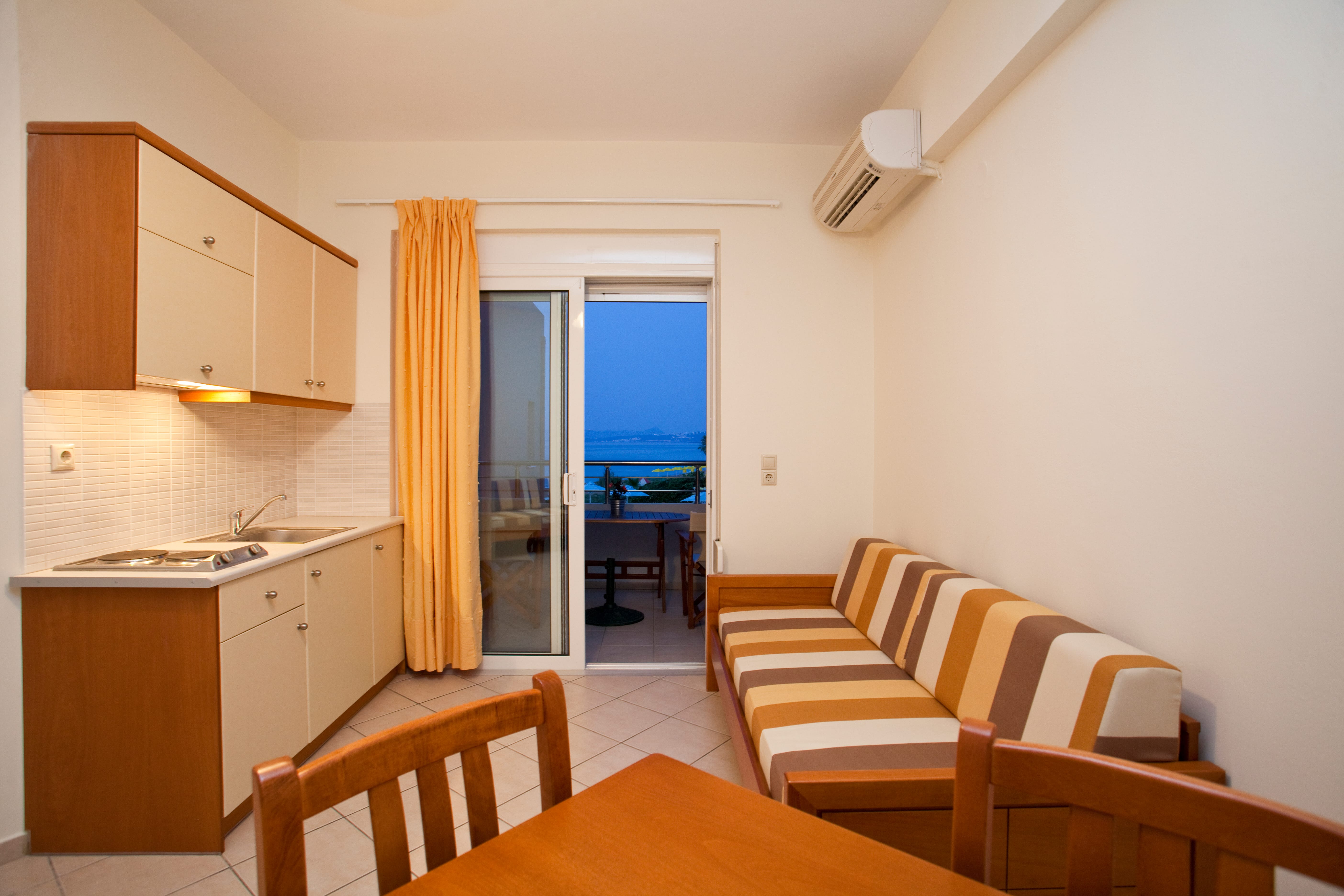 a room with a table and chairs