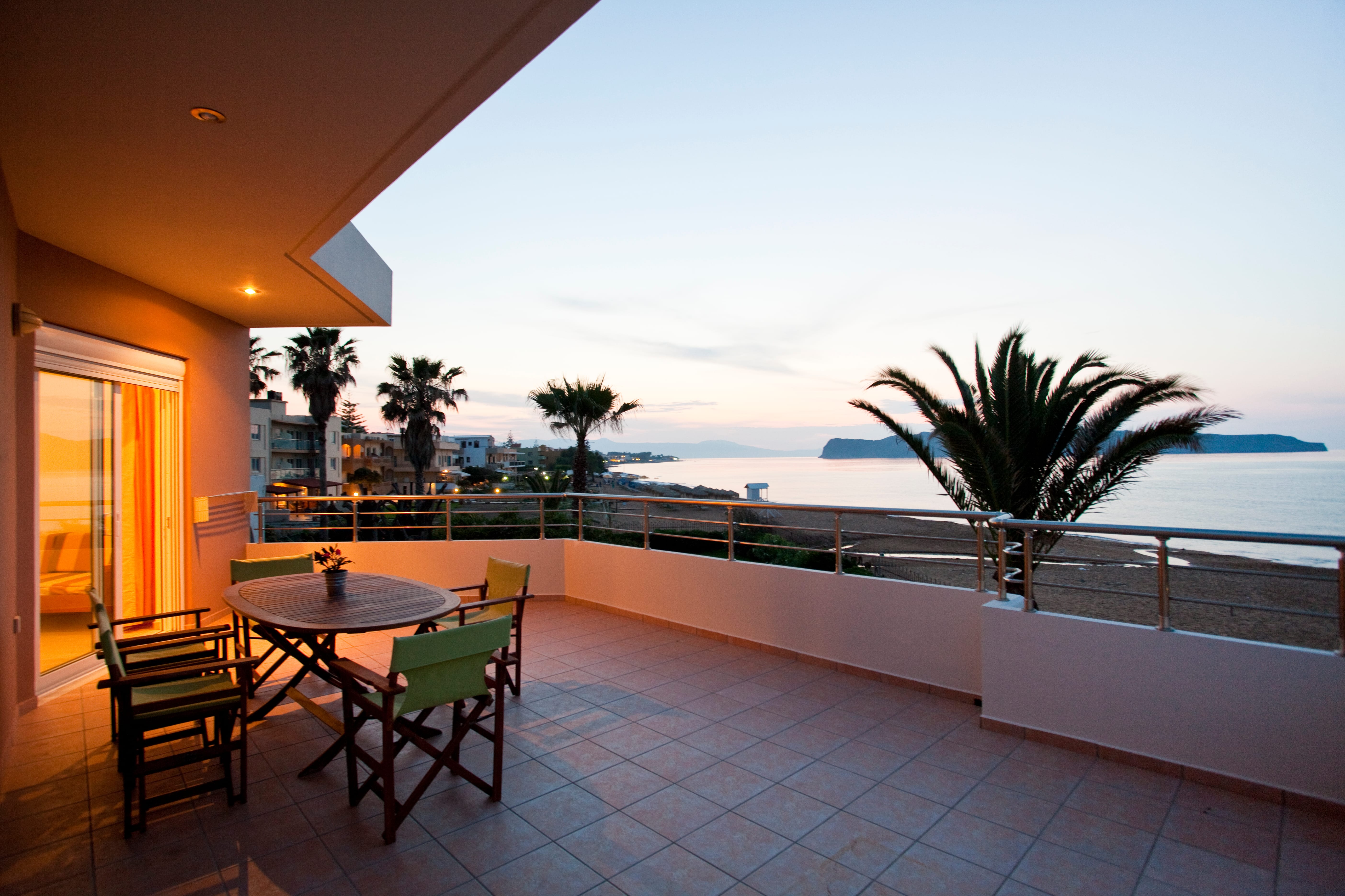 a table and chairs on a deck