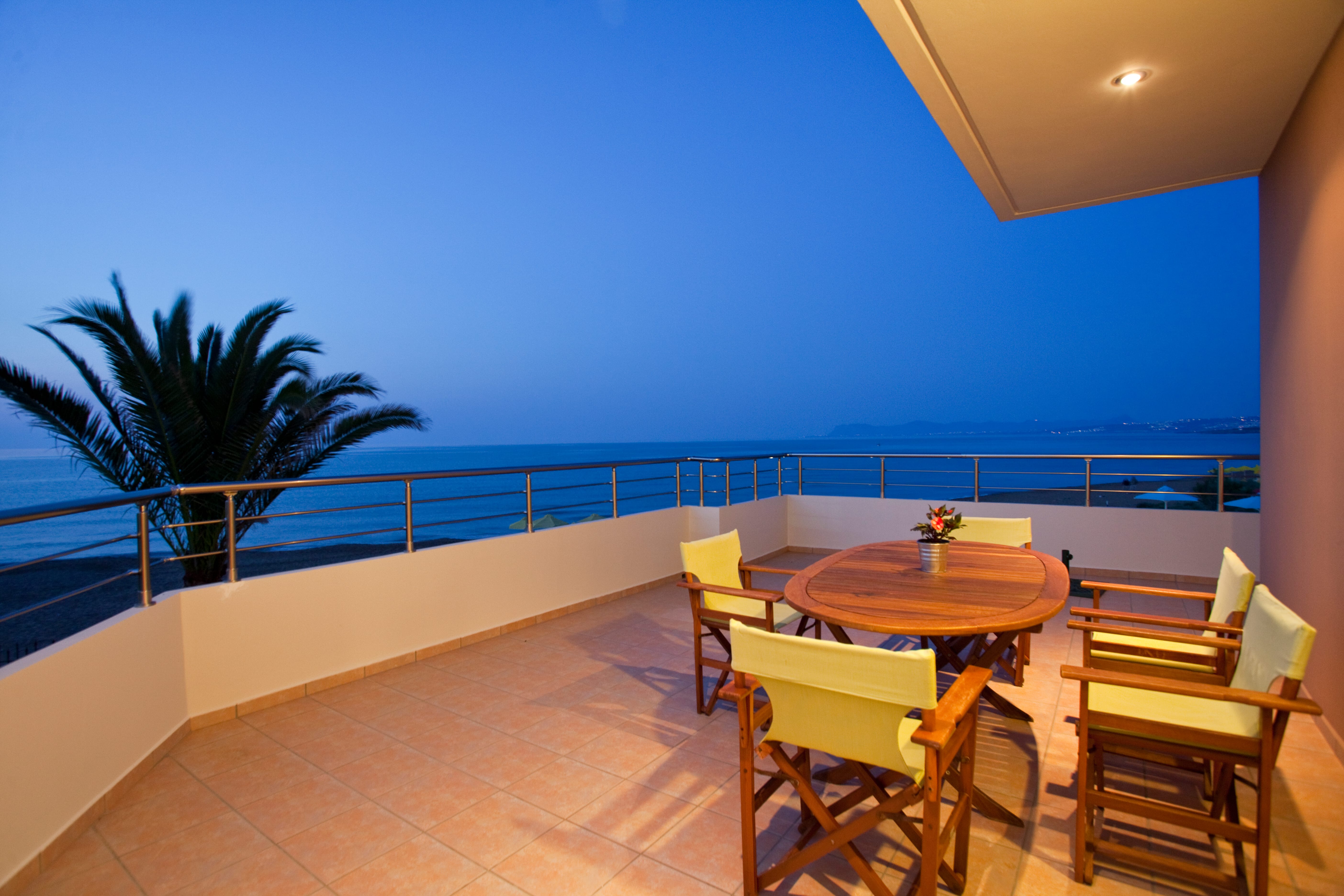 a table and chairs on a deck
