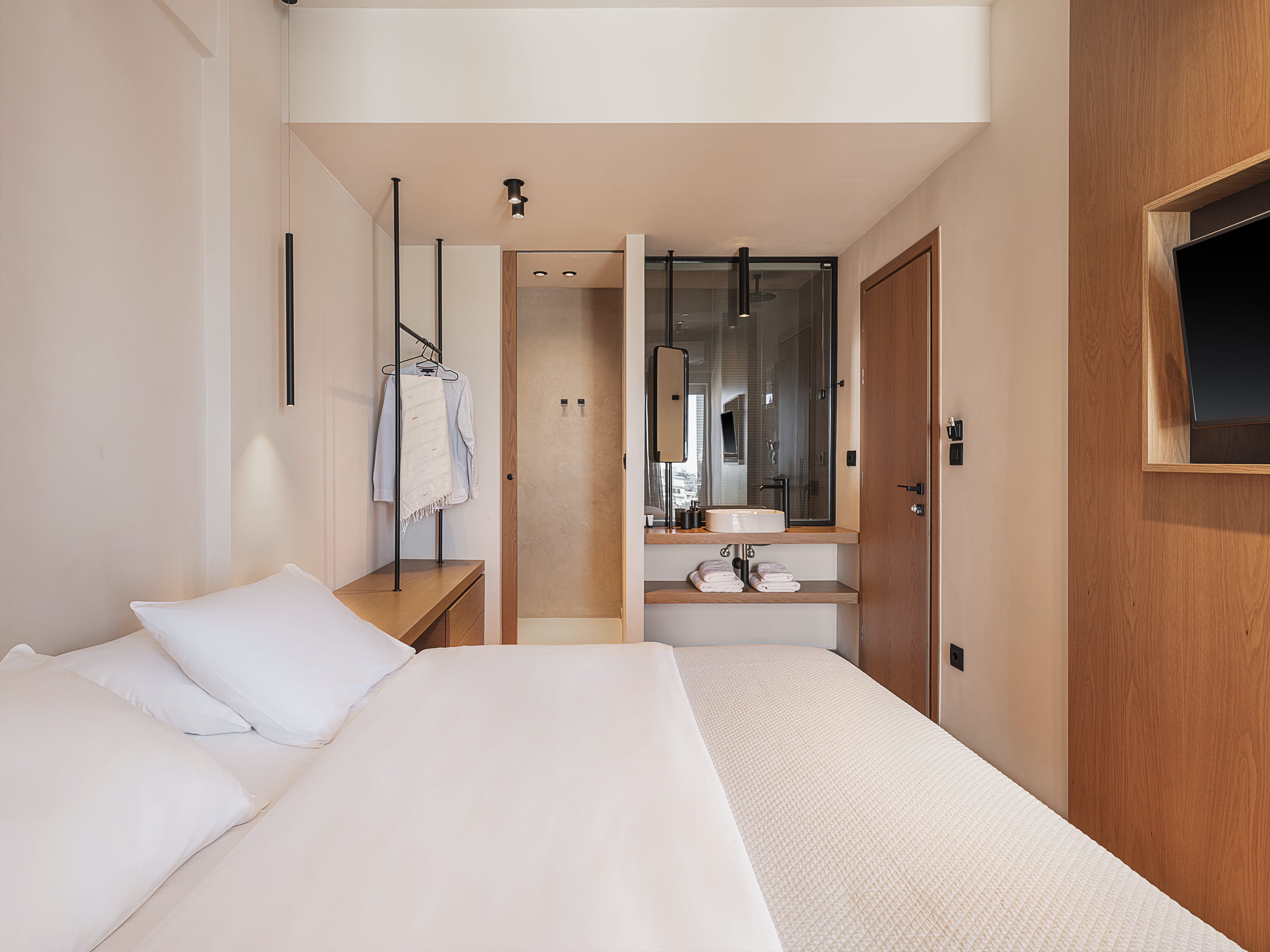 a hotel room with a large mirror