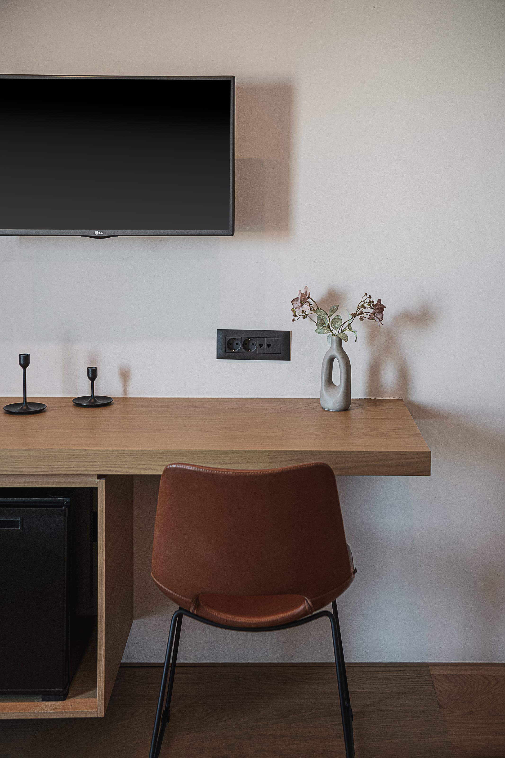 a chair in front of a television