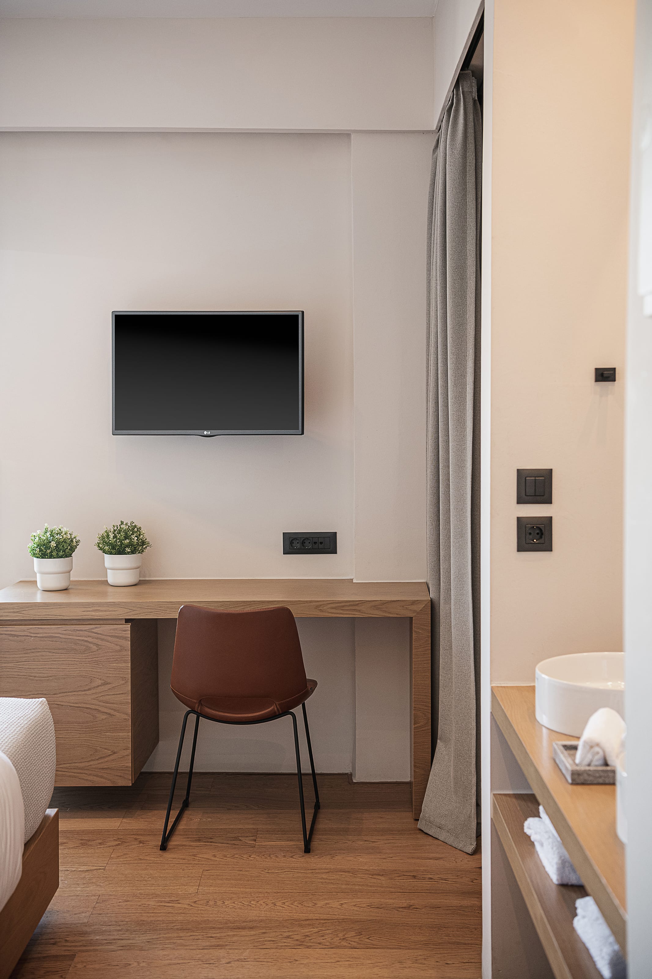 a room with a tv and a chair