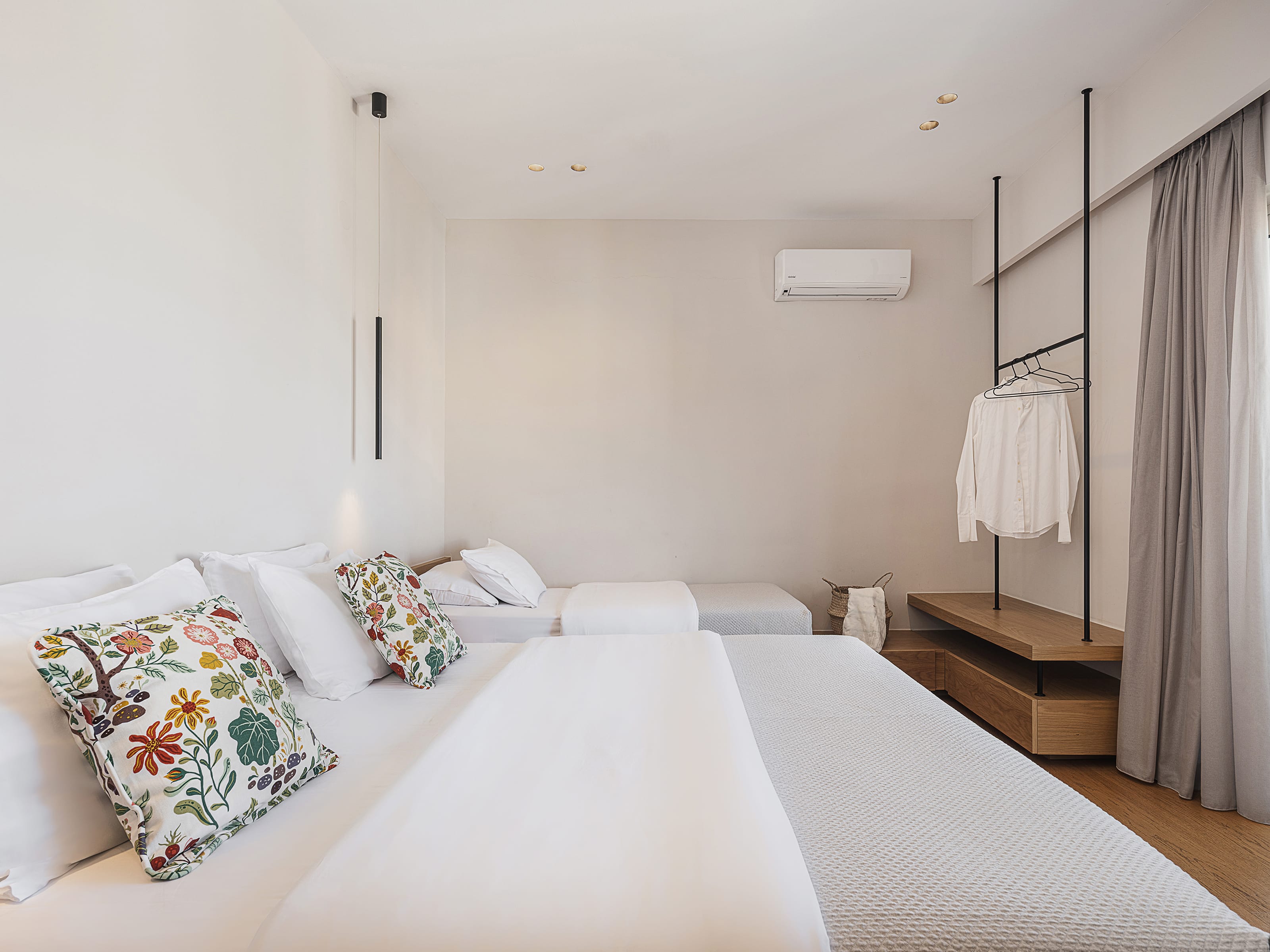 a bed with a white bed spread