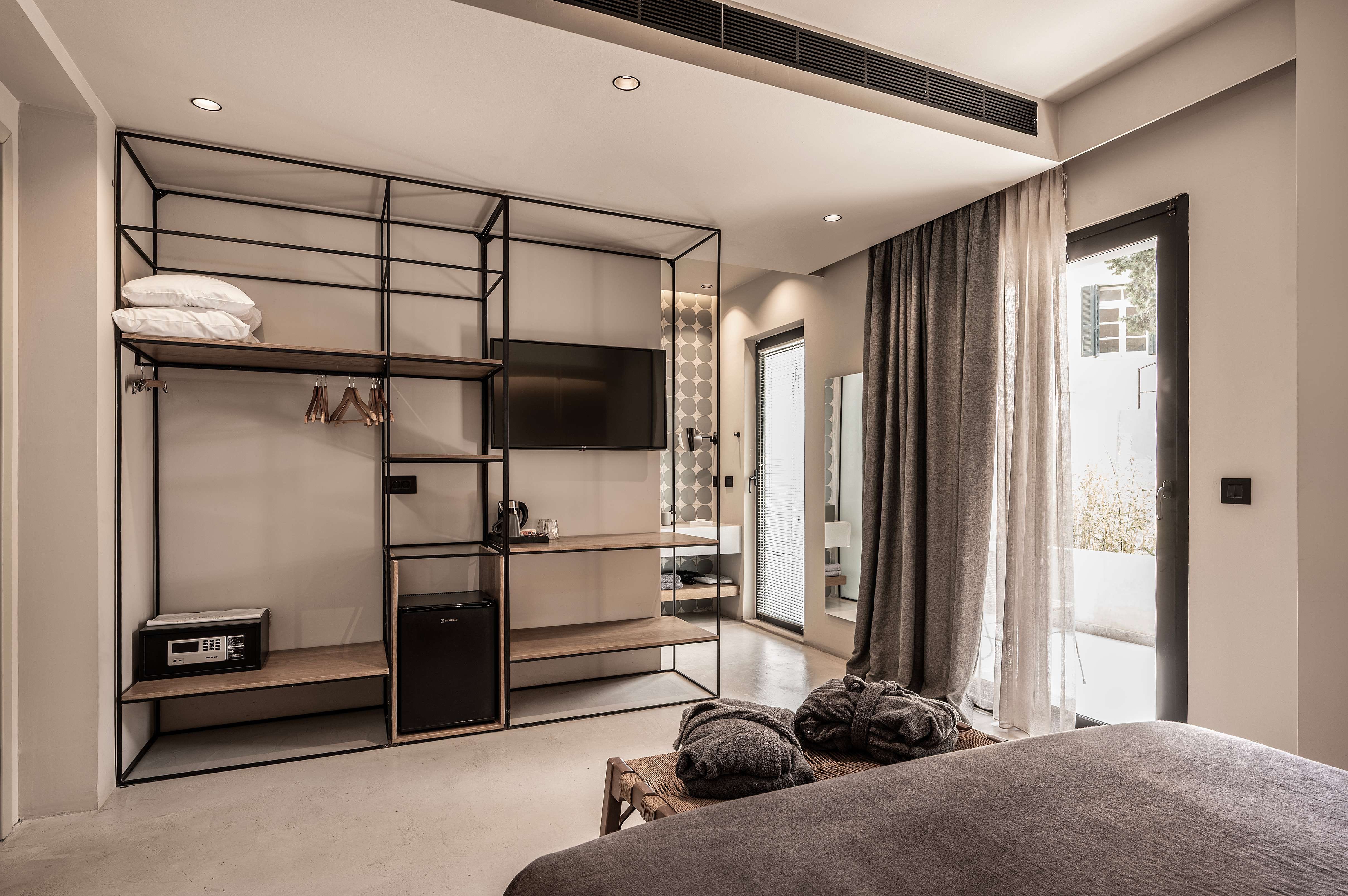 a bedroom with a bed and a closet