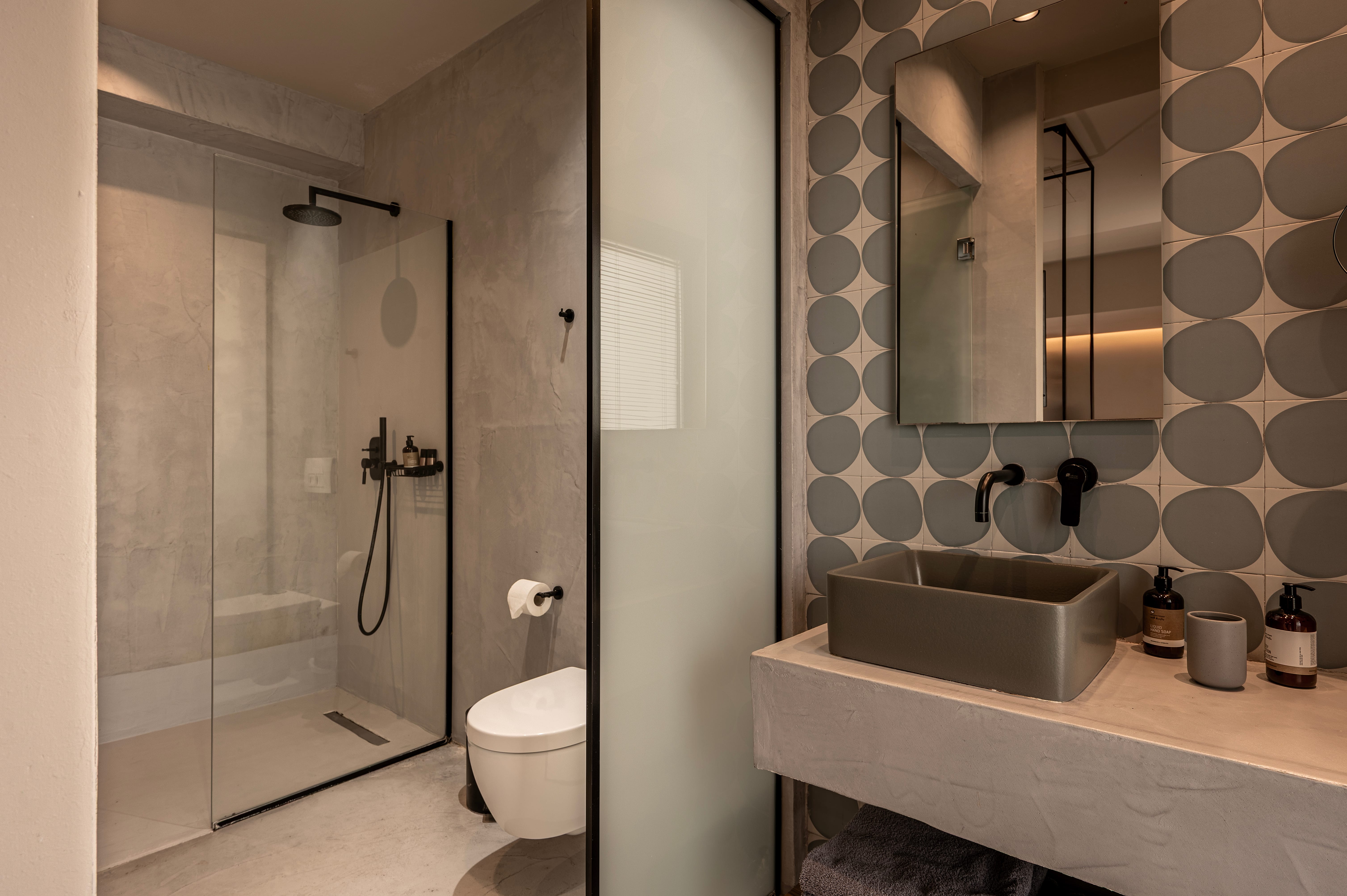 a bathroom with a glass shower