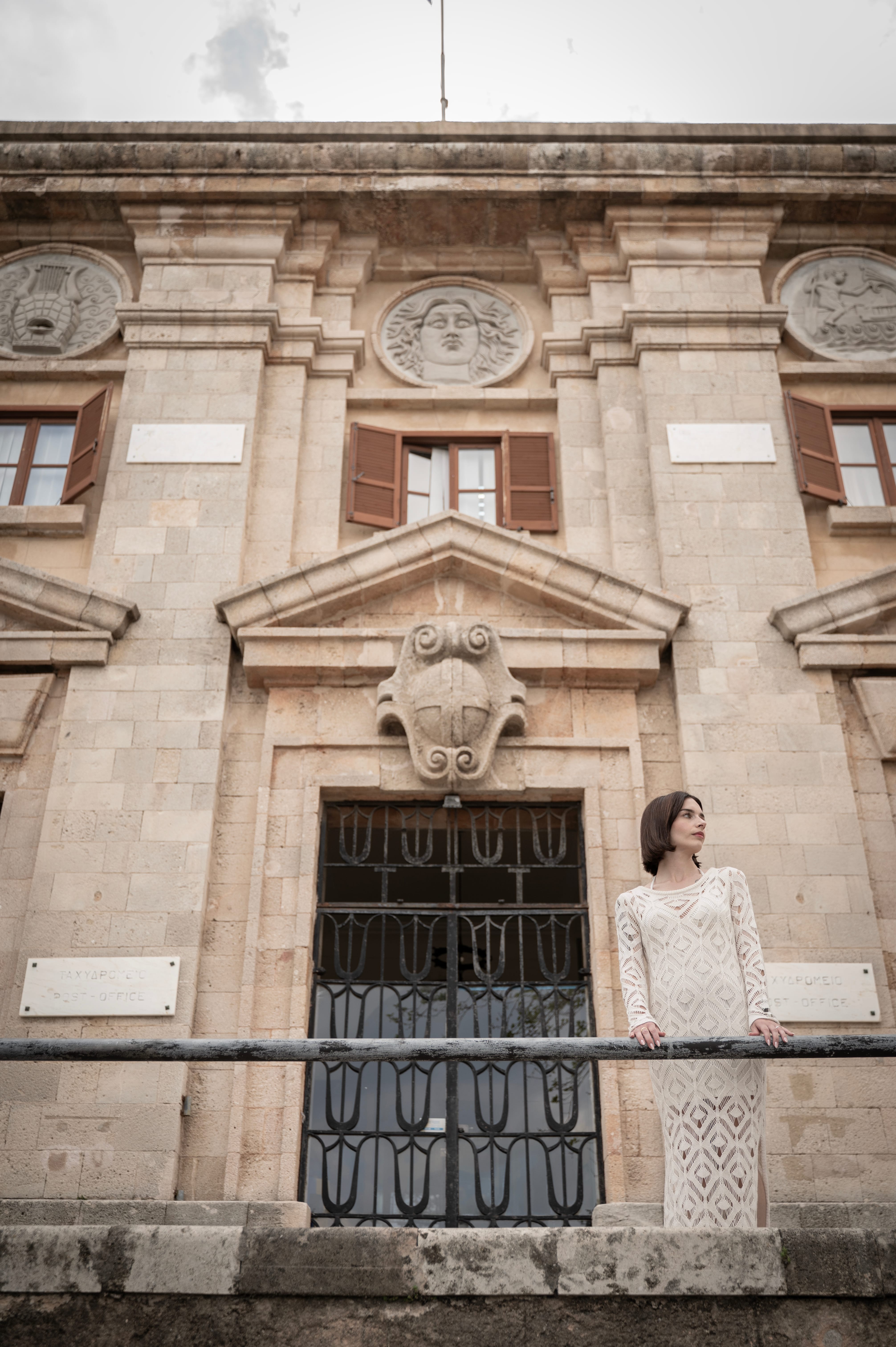 a person standing in front of a building