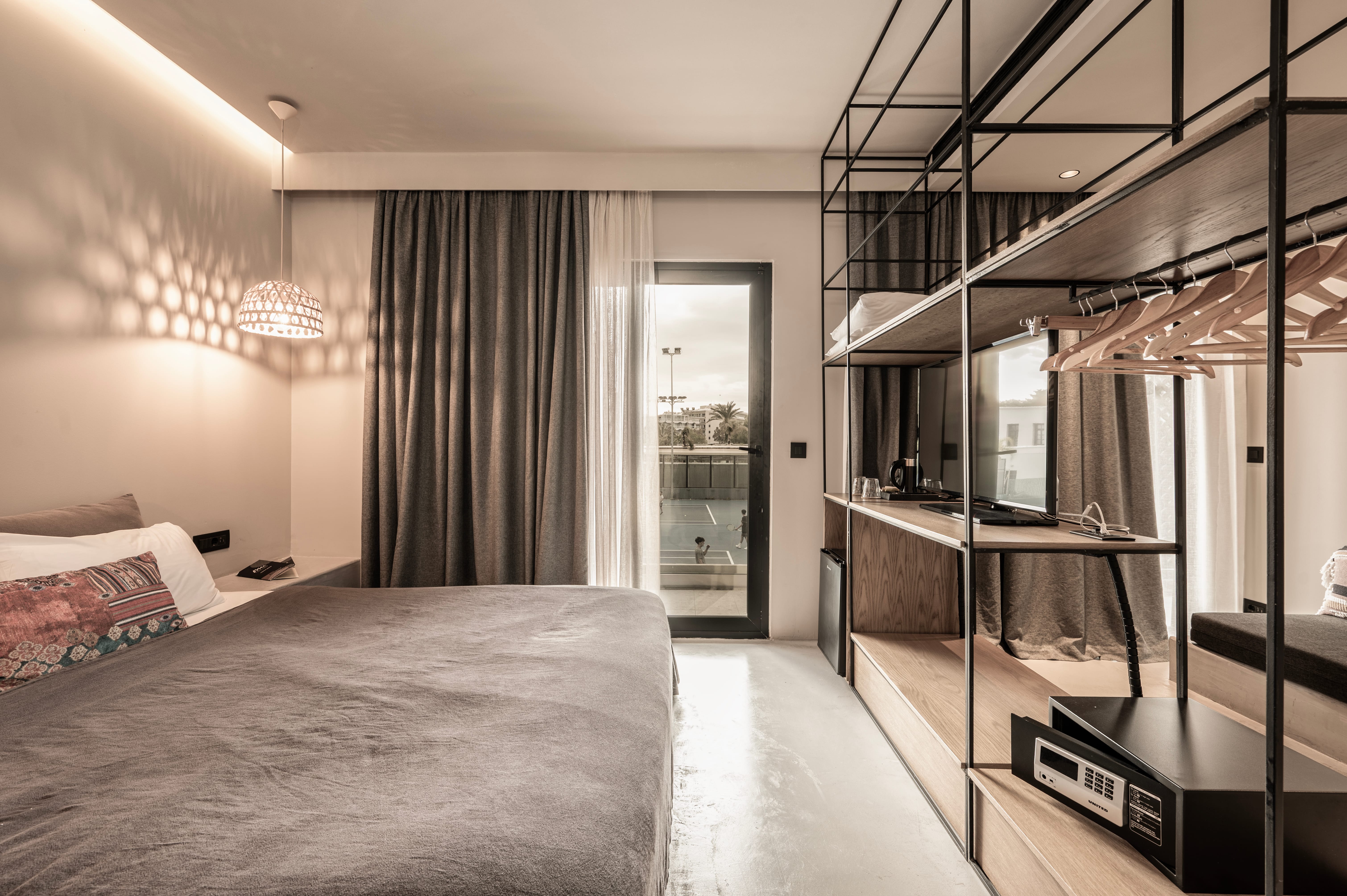 a bedroom with a glass door