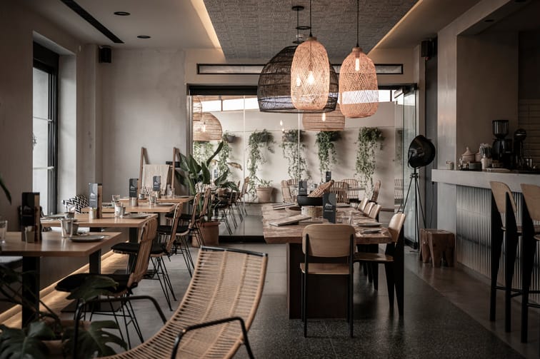 a room with tables and chairs