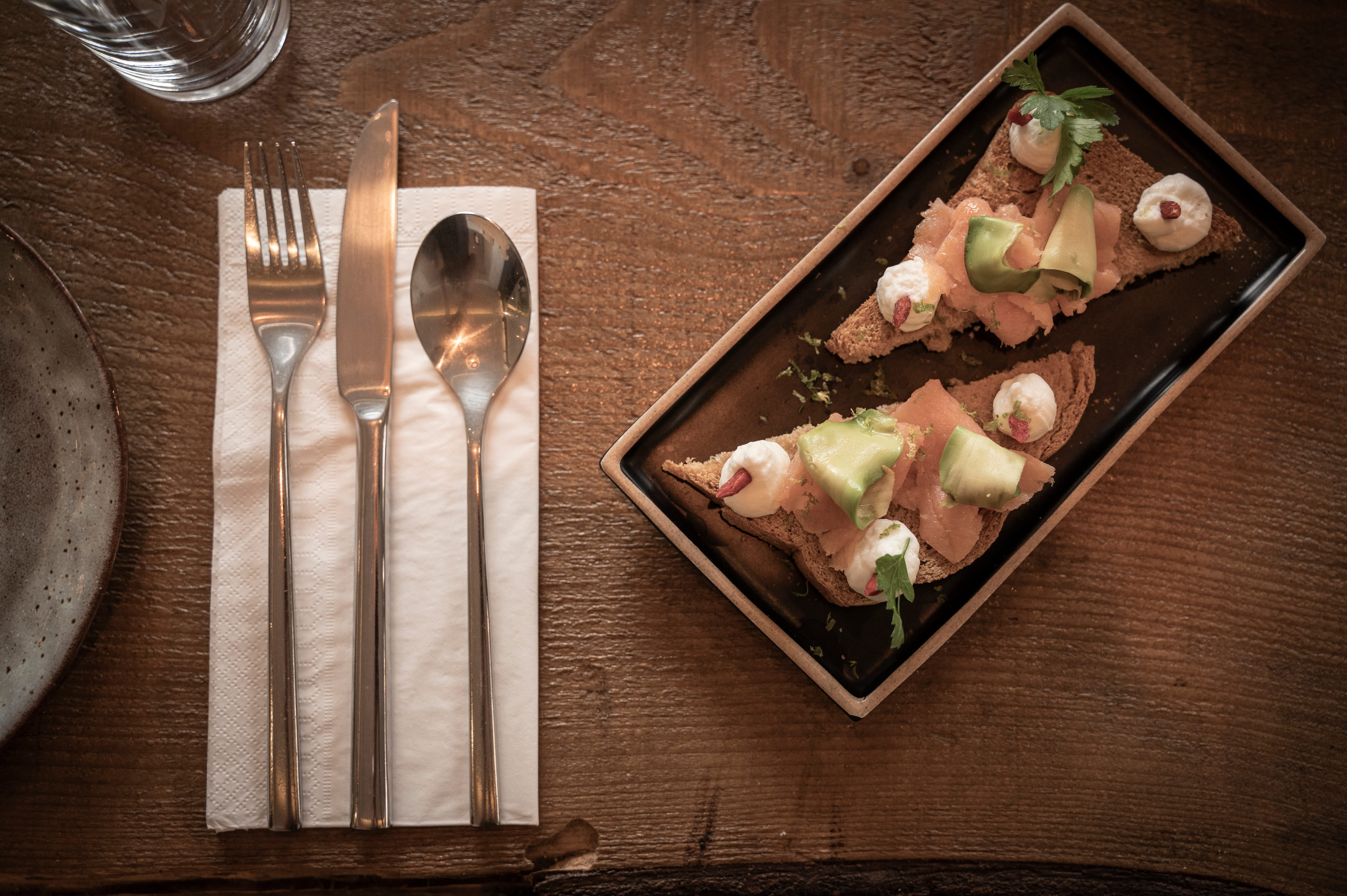a plate of food and silverware