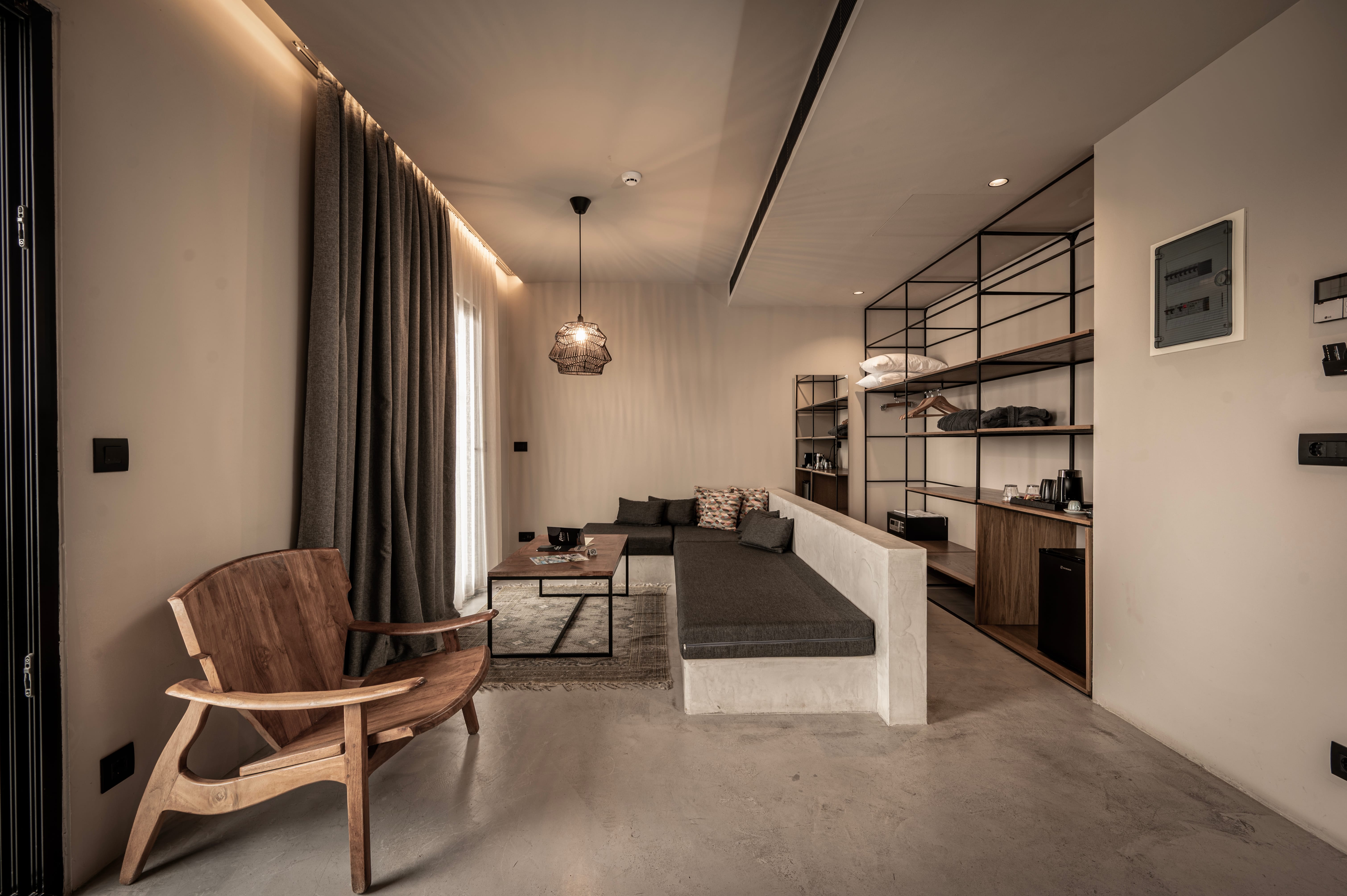 a room with a bed and a chair