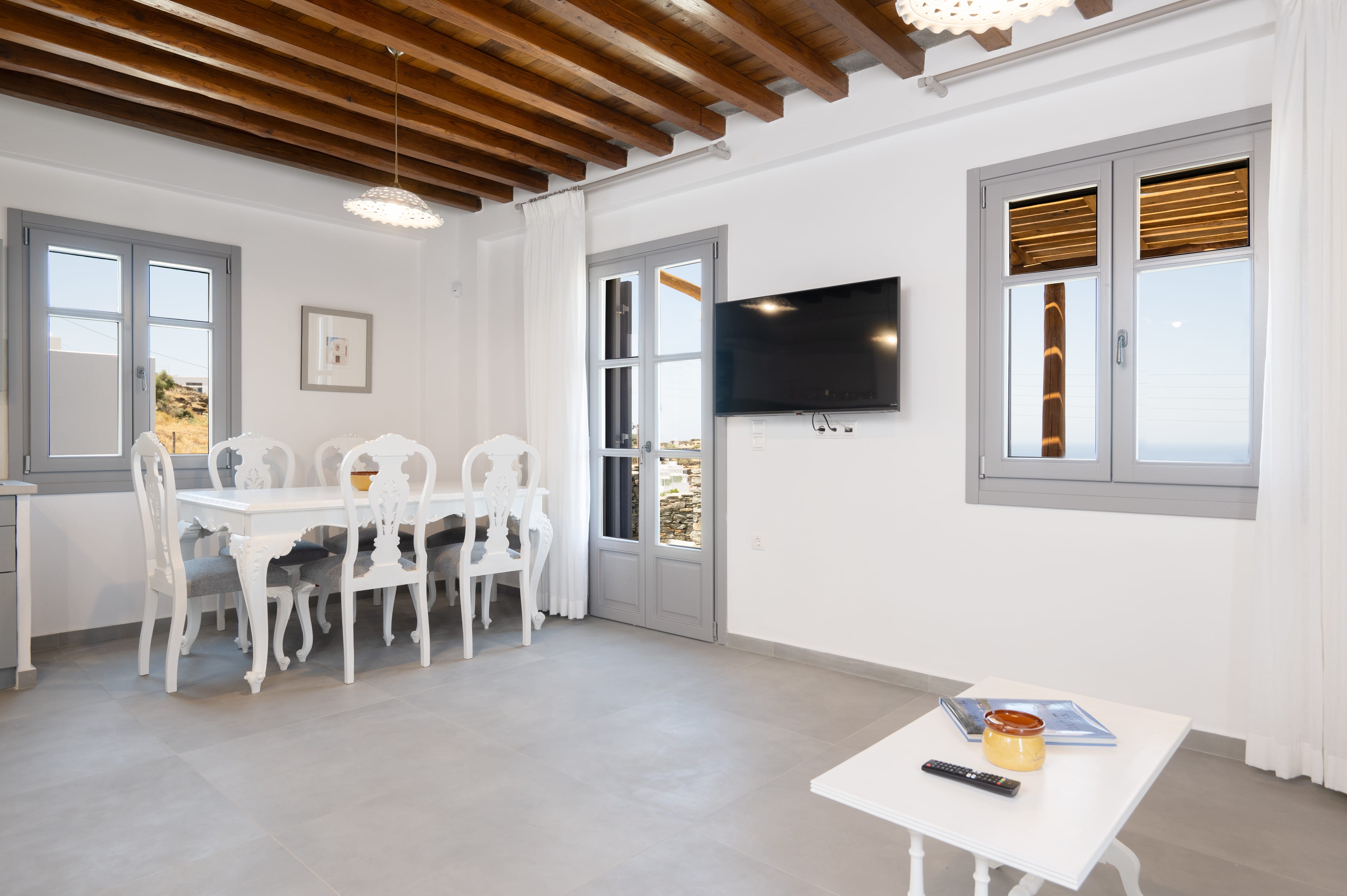 a room with a table and chairs