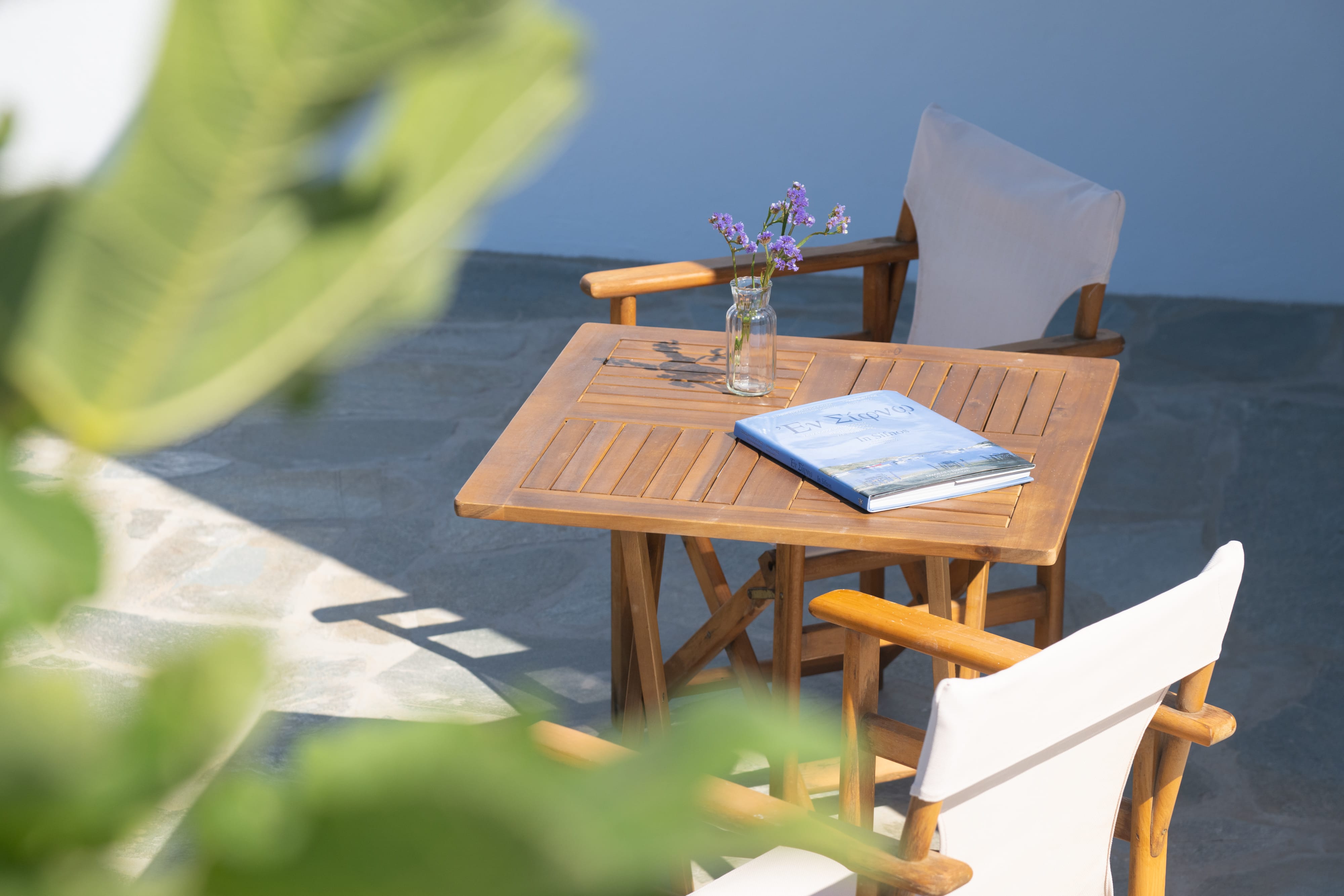a table and chairs on a patio