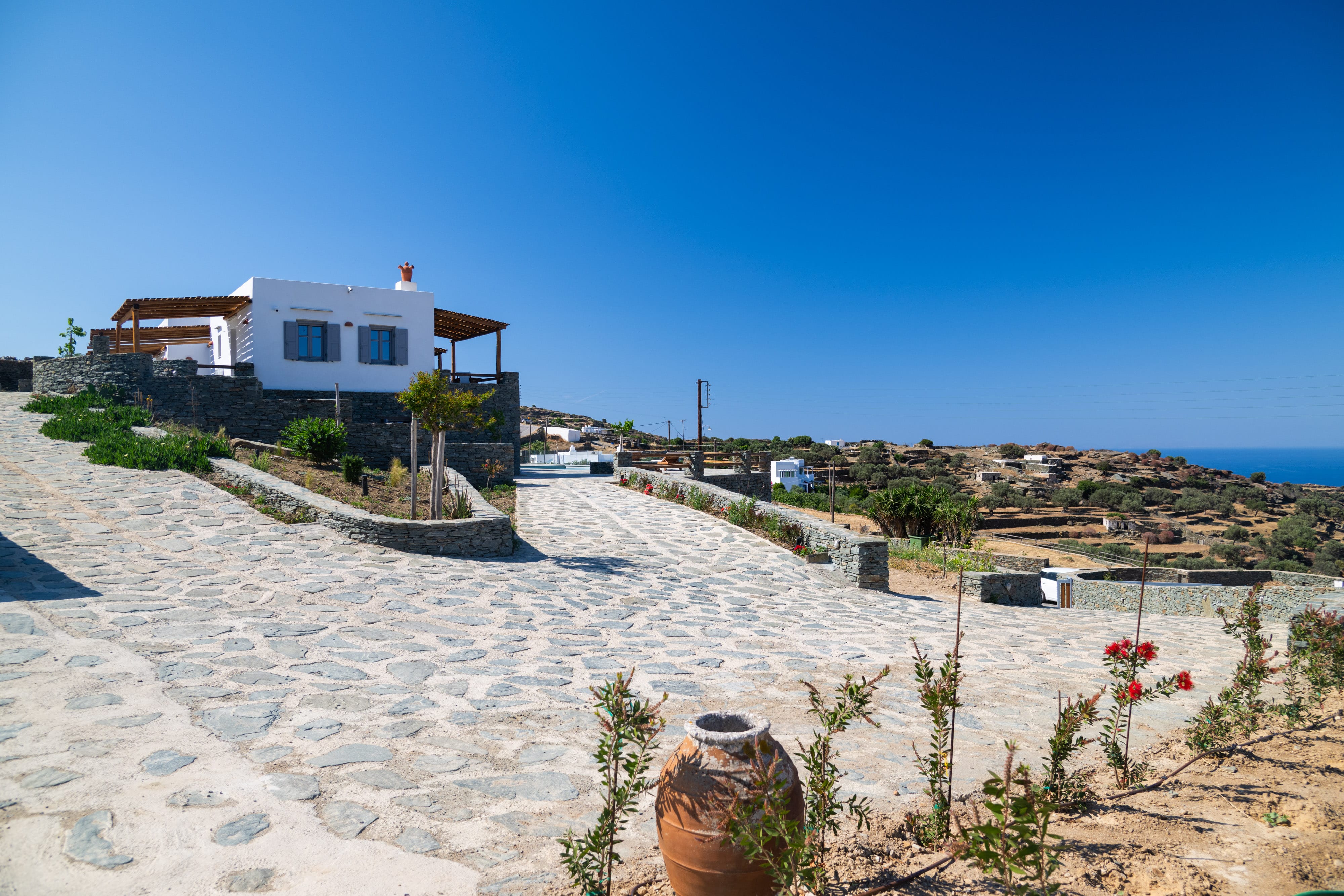 a stone path leading to a house