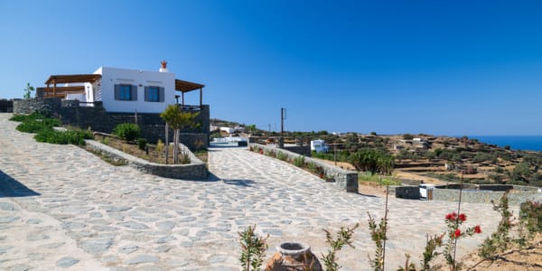 a stone path leading to a house
