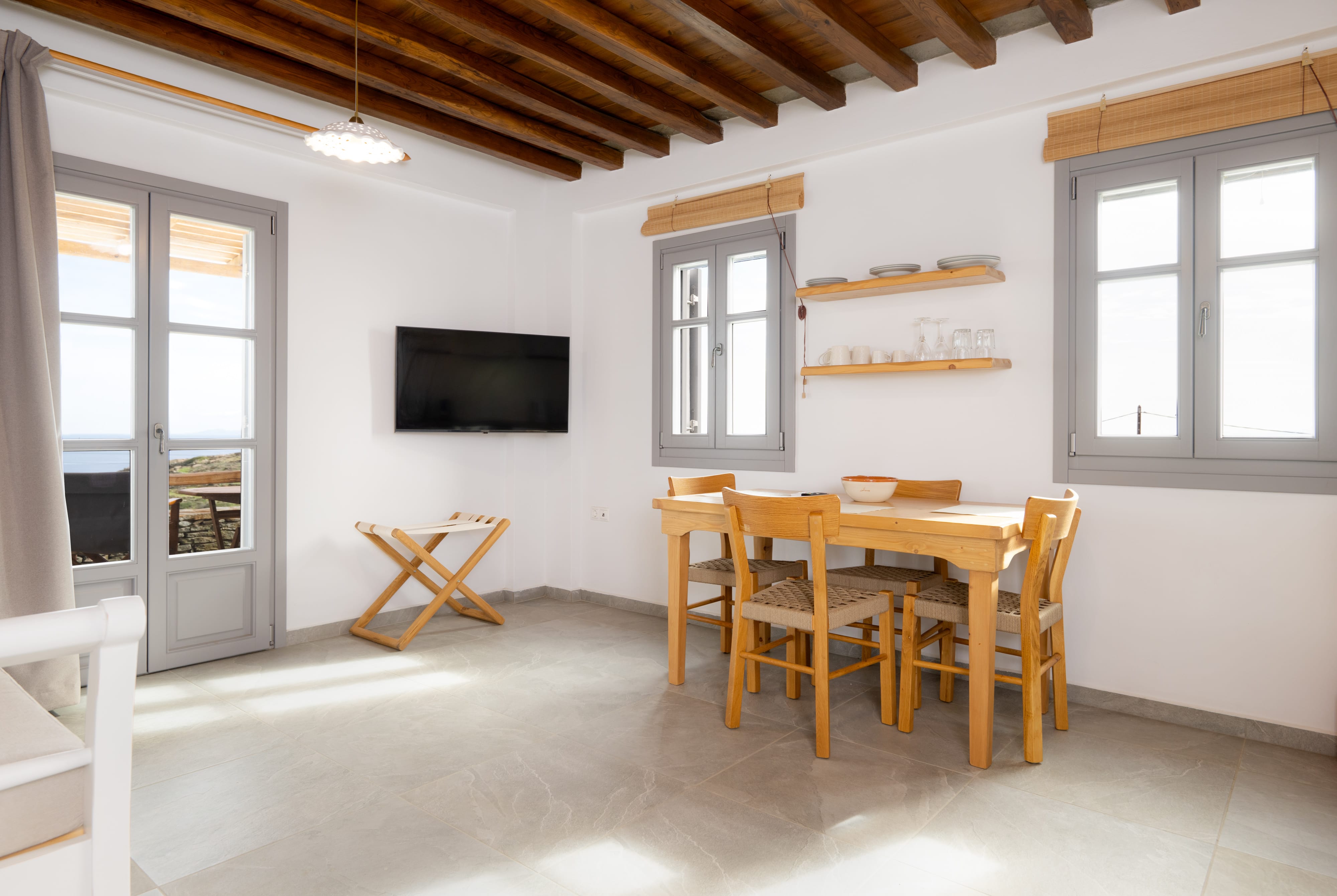 a room with a table and chairs