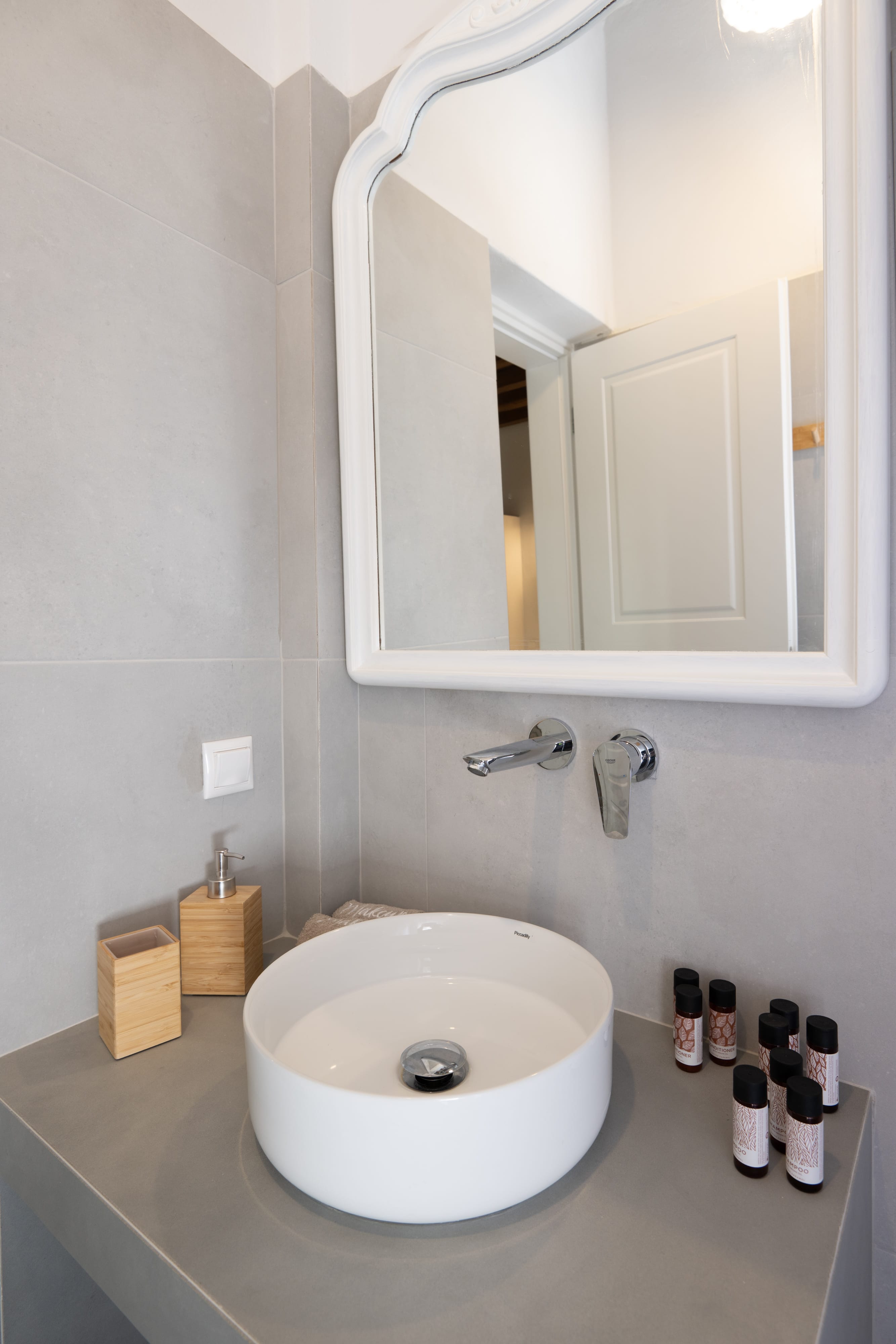 a bathroom sink with a mirror