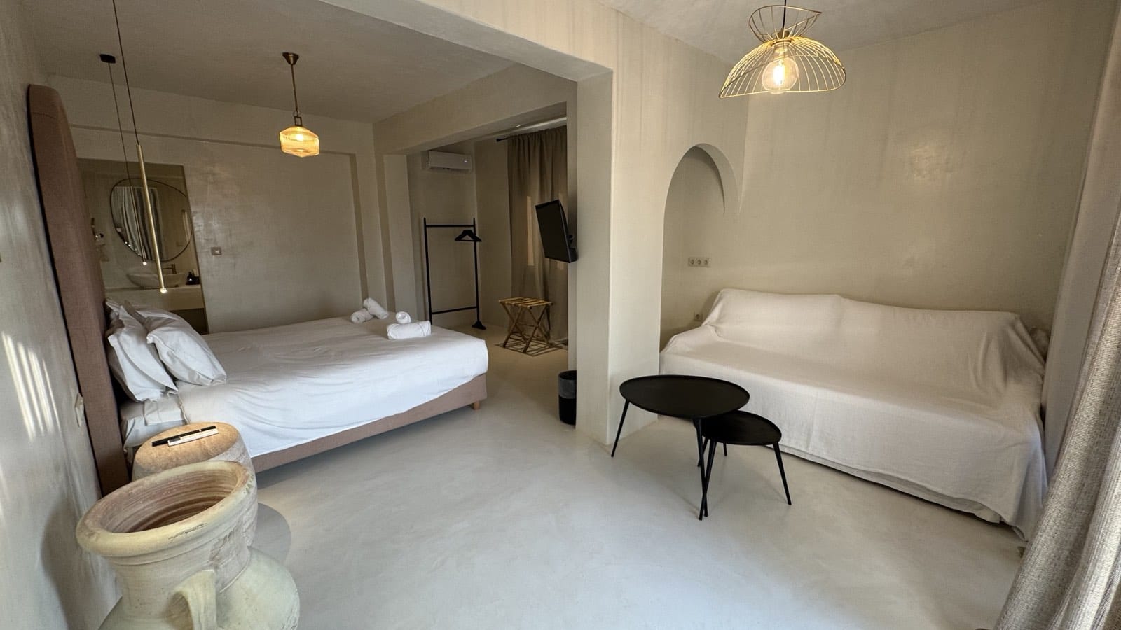 a room with a bed and a chair