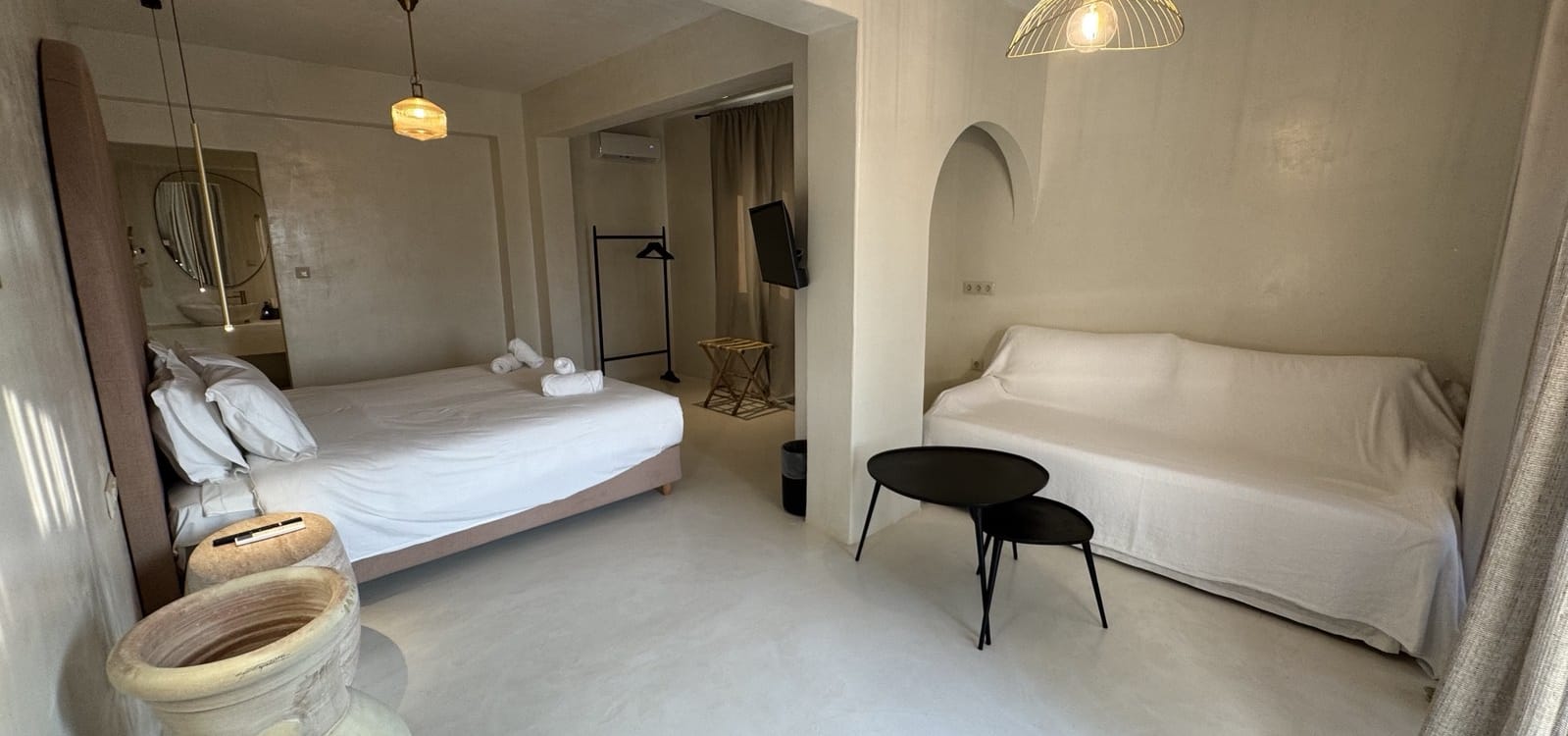 a room with a bed and a chair