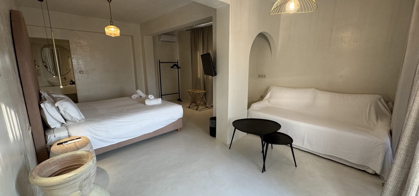 a room with a bed and a chair