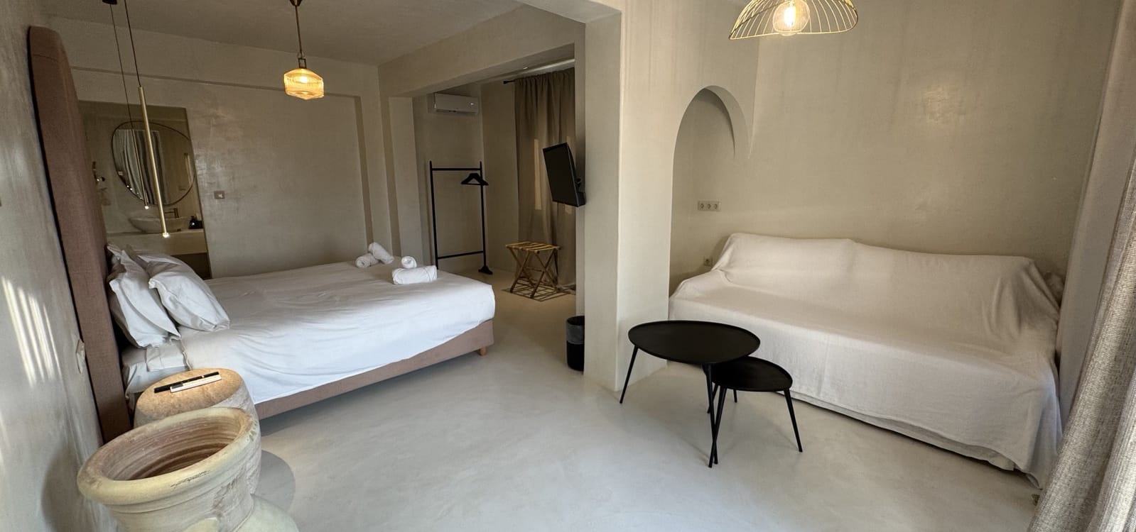 a room with a bed and a chair