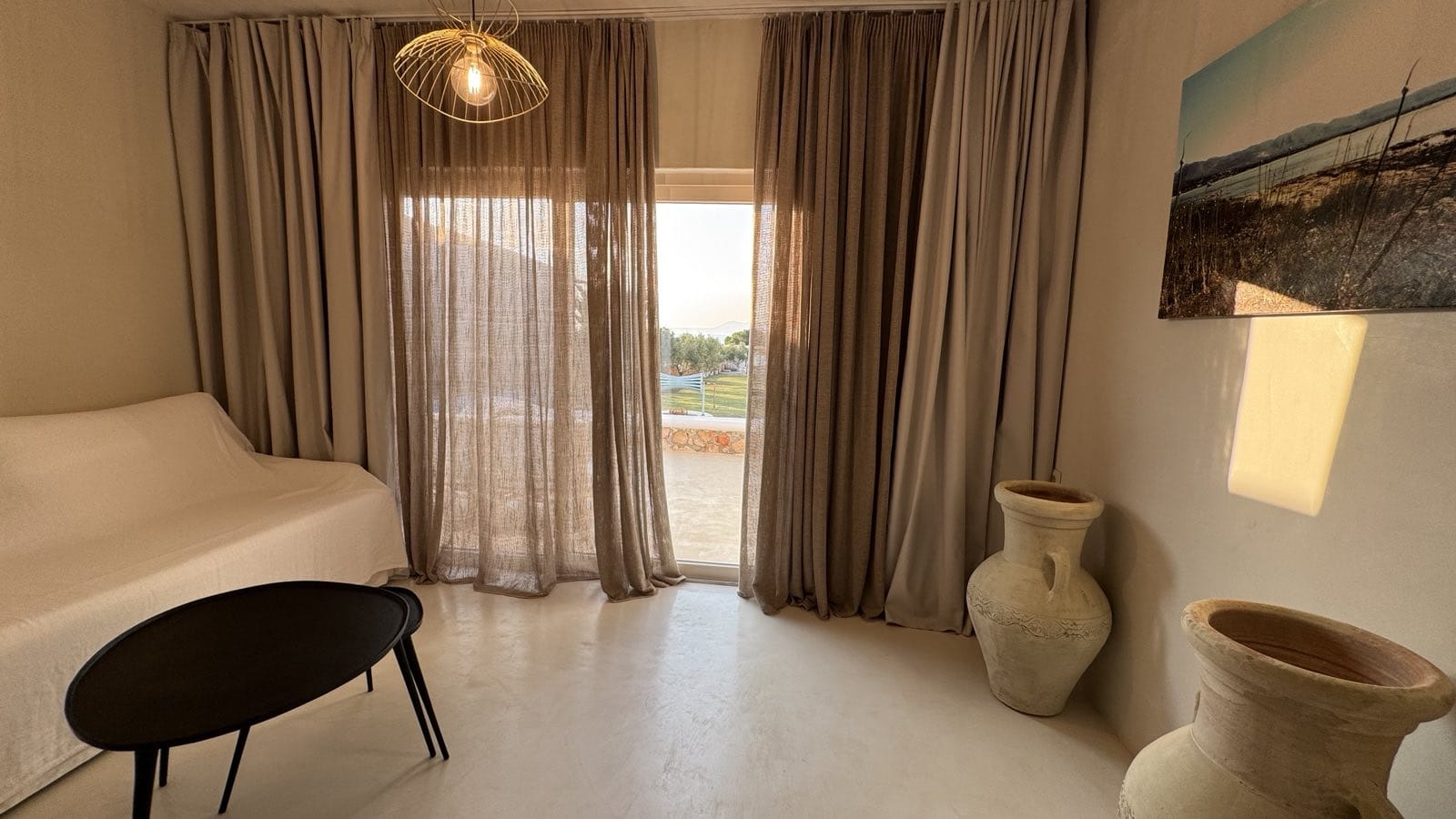 a room with a bed and a chair