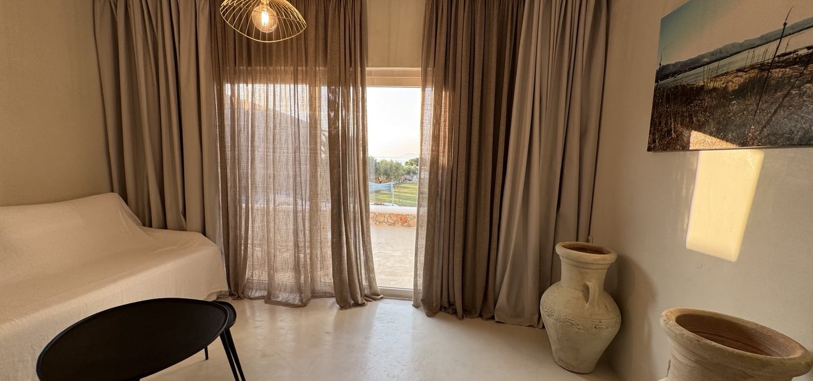 a room with a bed and a chair