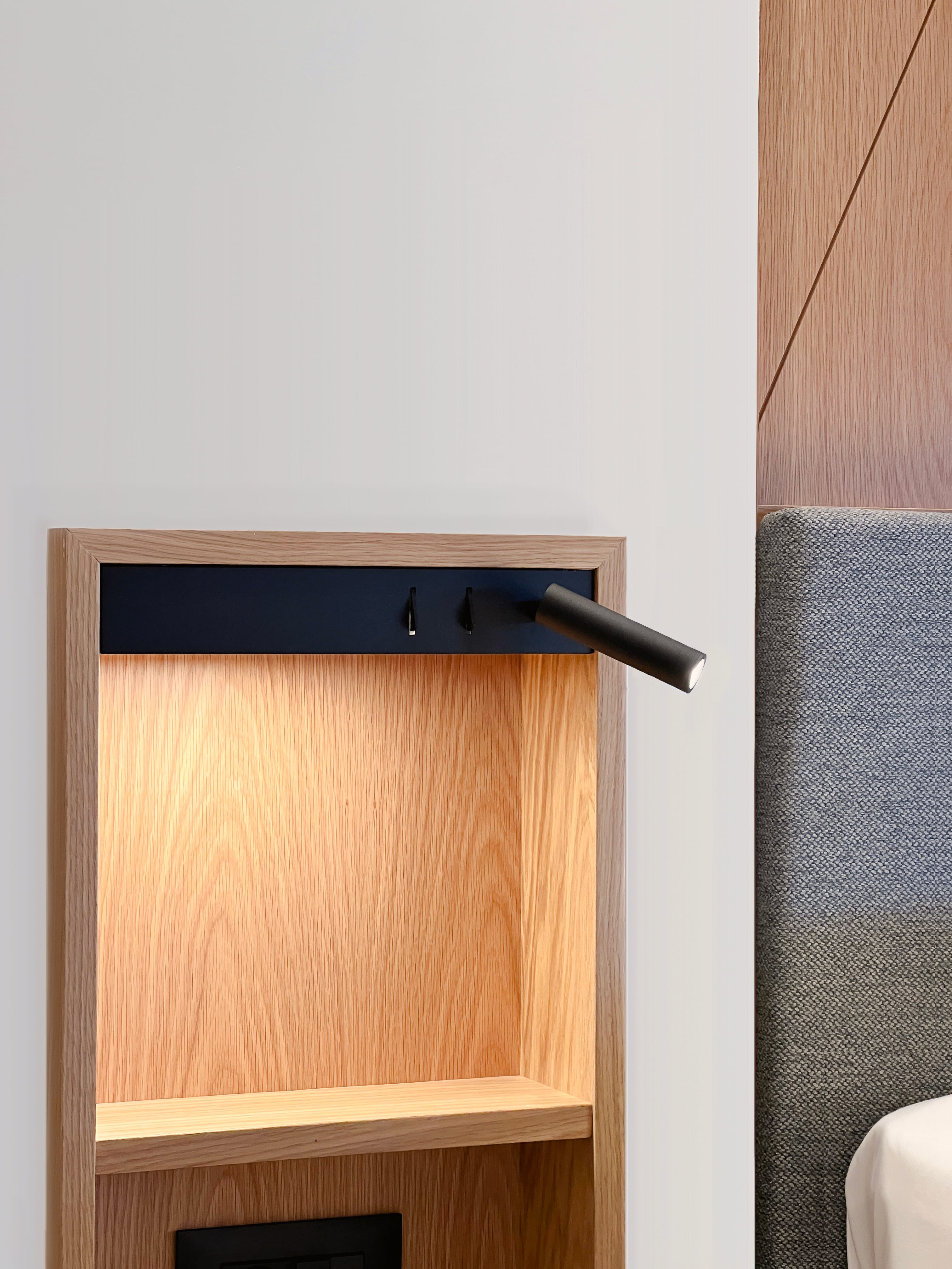a wood cabinet with a handle