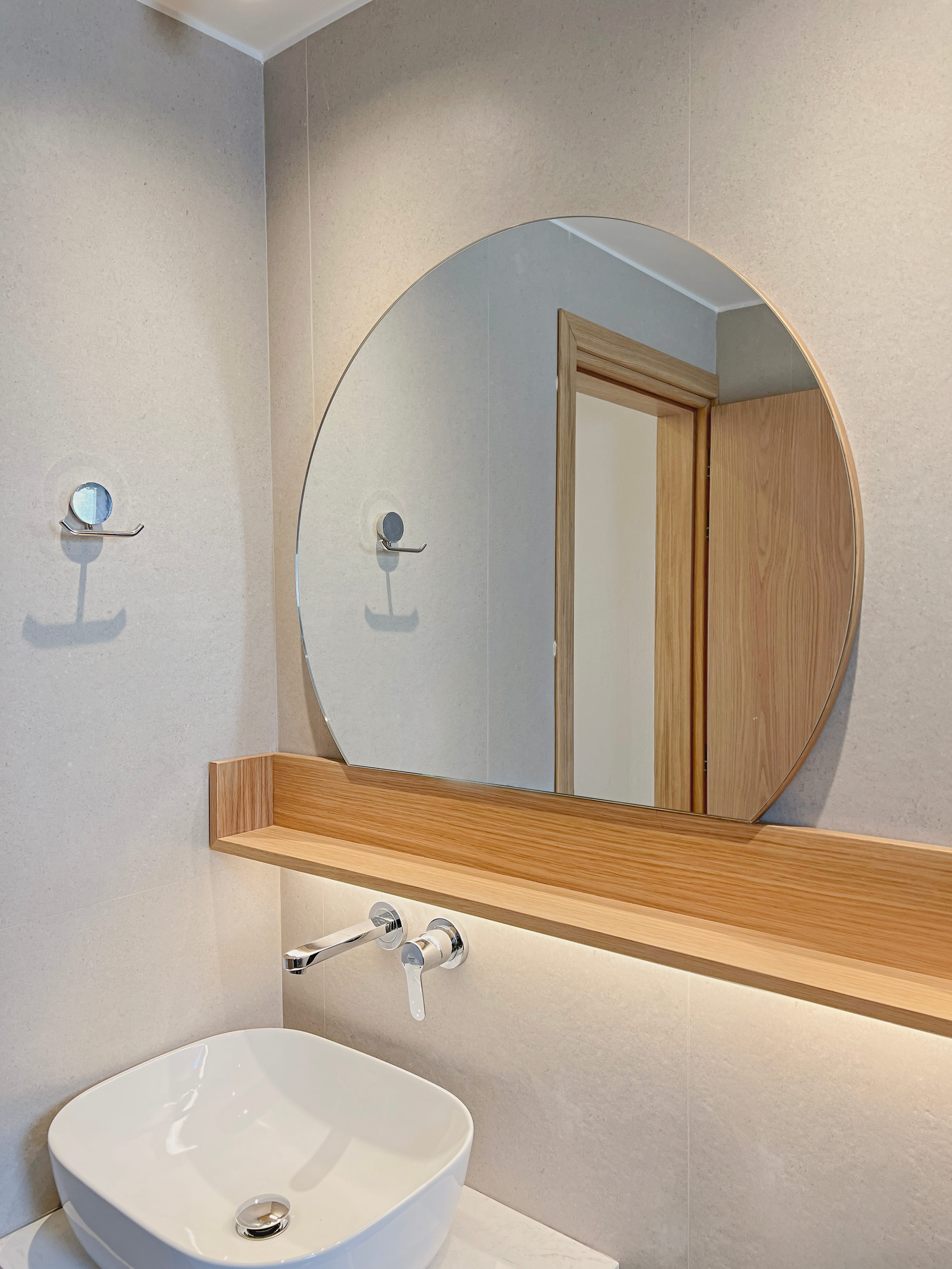 a bathroom with a large mirror