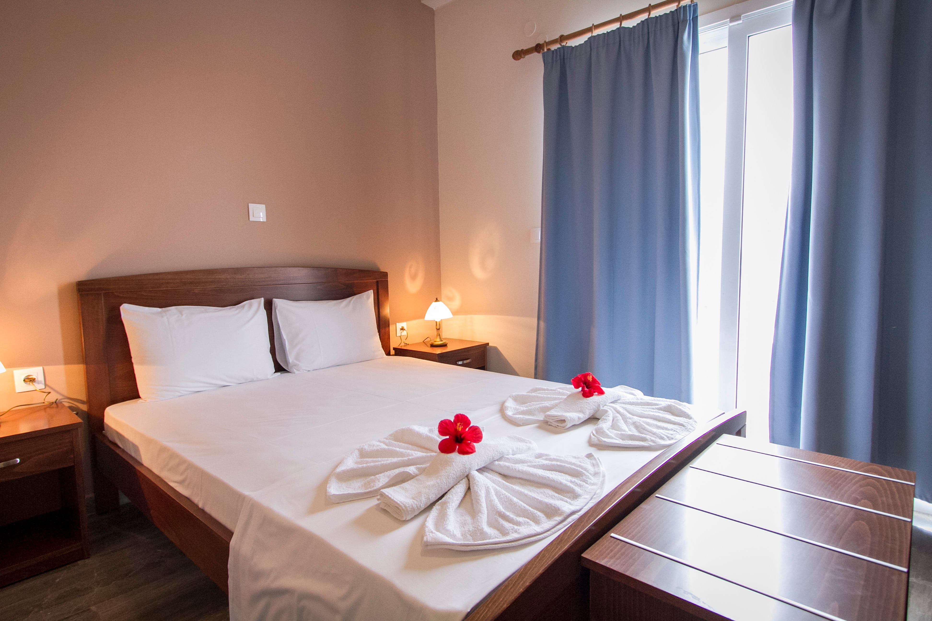a bed with a white bed spread