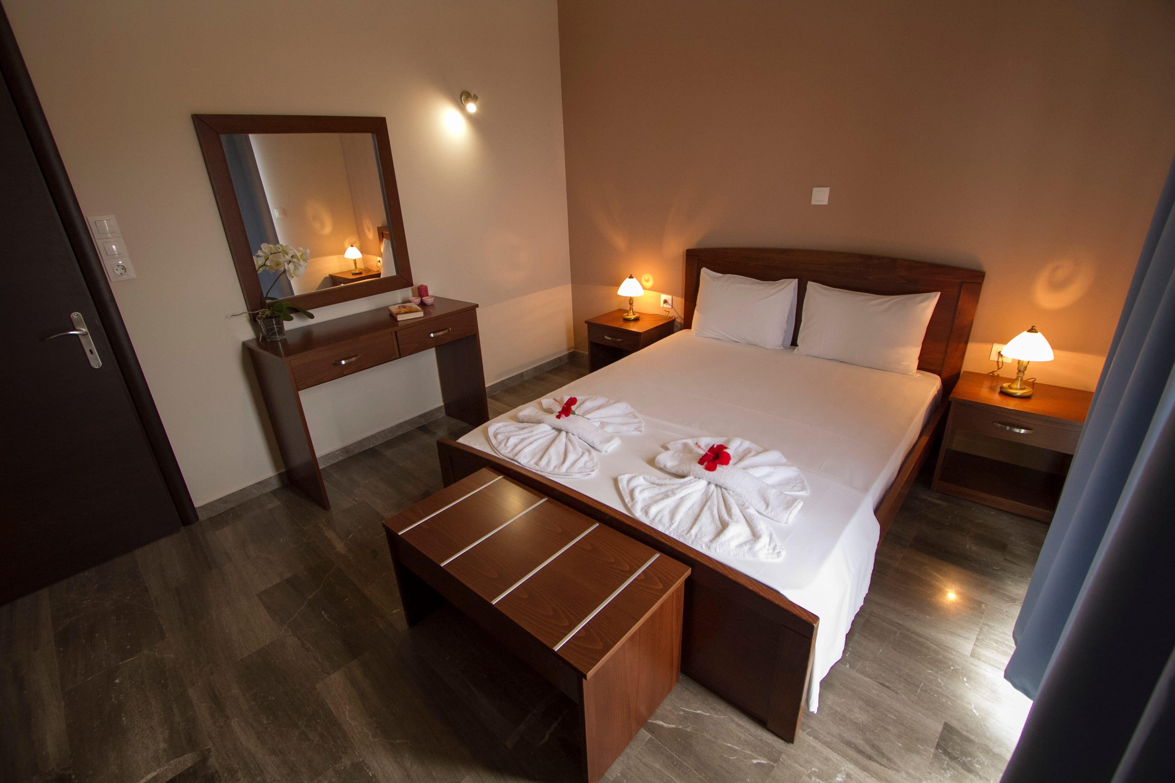 a bed with a flower on it