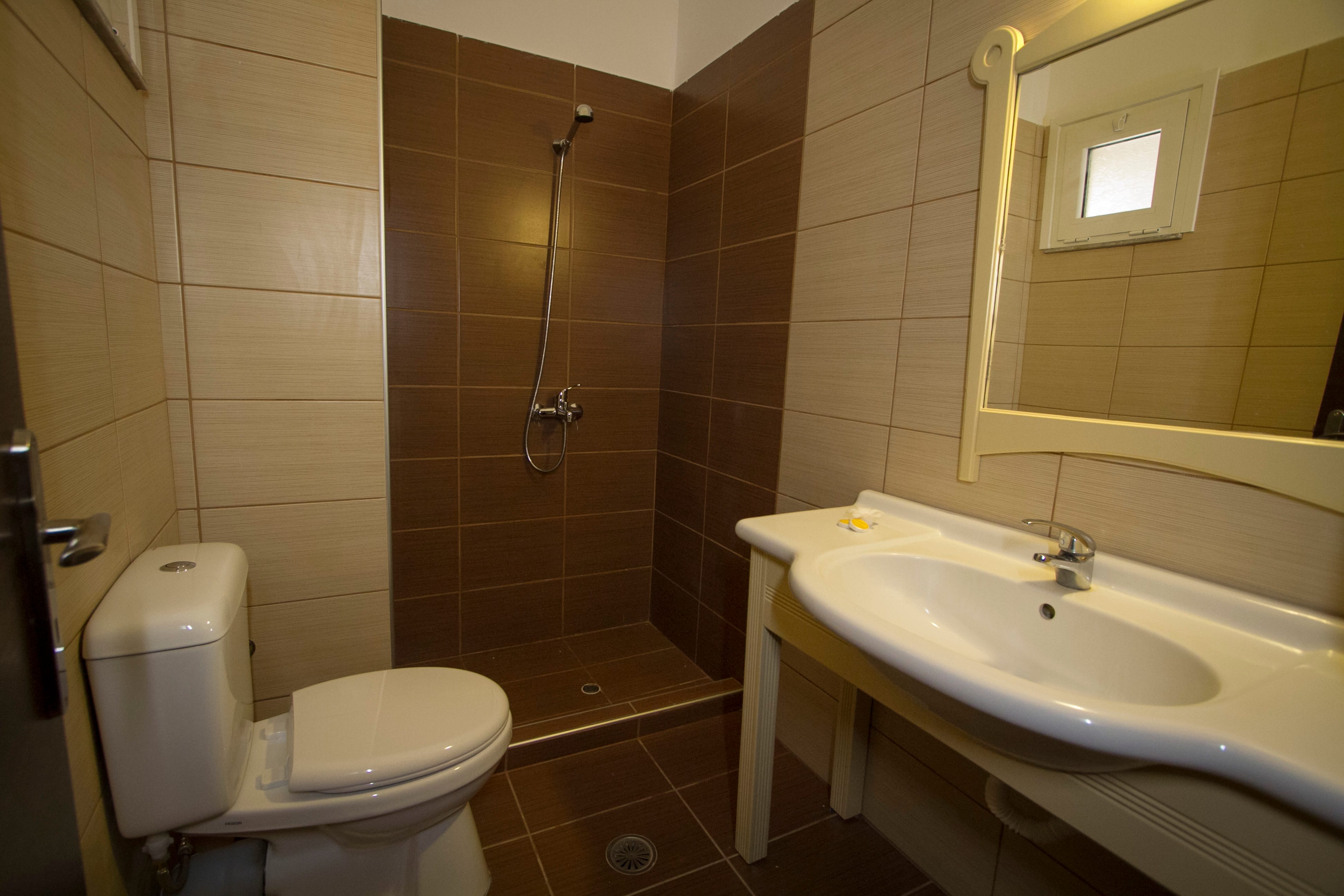a bathroom with a sink and toilet
